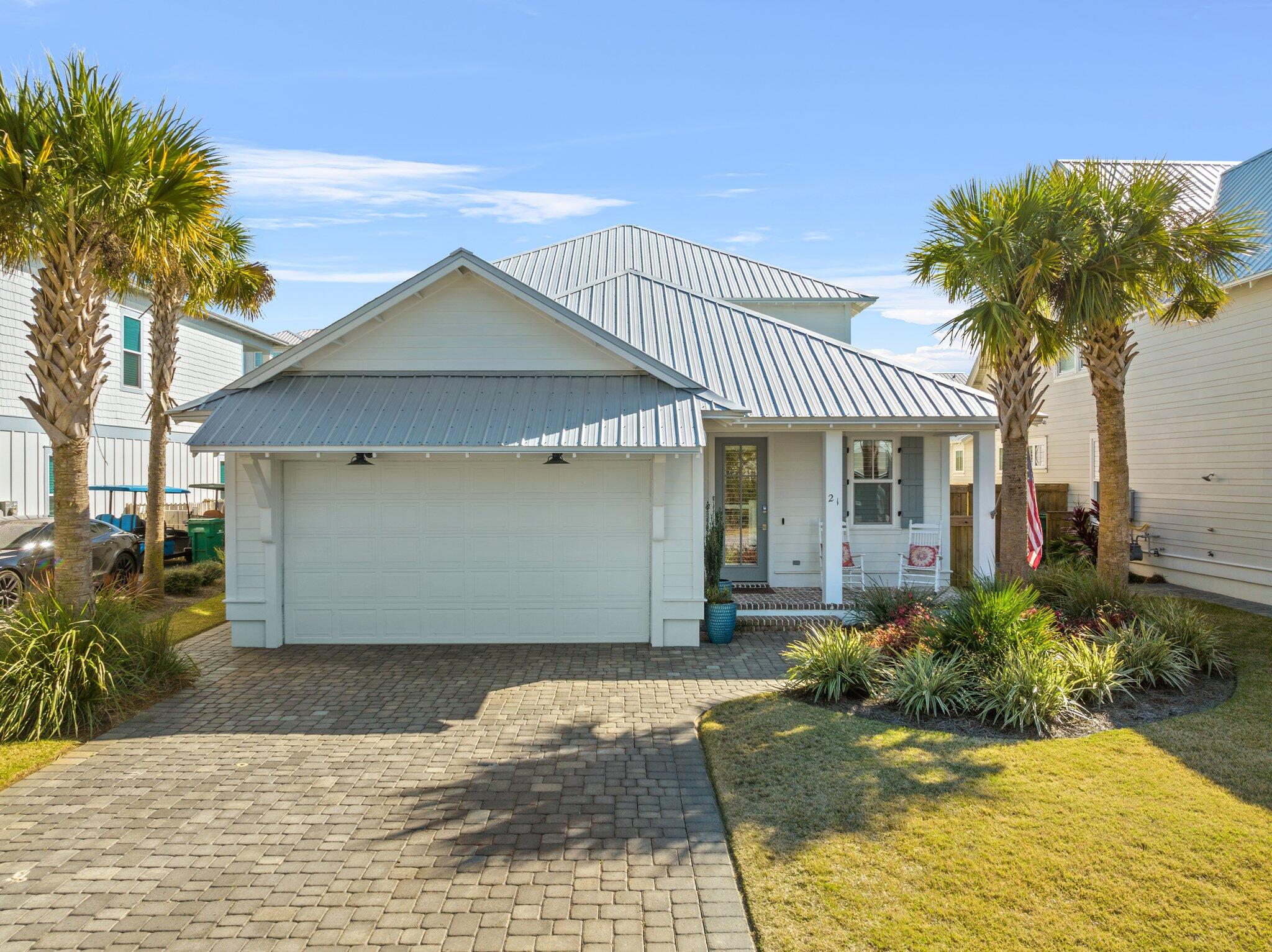 Incredible opportunity to own this stunning coastal cottage in the highly desired Frangista Beach community with deeded beach access less than ½ a mile away. The charming cobblestone driveway, beautiful landscaping, and welcoming front porch give this home great curb appeal. Upon entering you are greeted with 10 ft ceilings, a spacious open floor plan, and hardwood floors throughout. The kitchen features an island with a large breakfast bar and pendant lighting above, Quartz countertops, subway tile backsplash, and a Bosch stainless steel appliance package. Just off the kitchen is the open dining area with a built-in buffet and plenty of space to host family gatherings. This home would make a great primary residence, second home, or a strong rental property as it's projected to do $114.8K! The living area is nice and bright with ample natural light and has direct access to a fantastic screened-in back porch. The screened-in back porch is perfect for outdoor dining and lounging while watching your favorite TV shows and sports games. The home has many notable features throughout including 8' grand doors, 6" crown molding, 8" baseboards, recessed lighting, and touches of shiplap giving it that amazing coastal feel so many love. The spacious master bedroom is ideally located on the first floor and features an en suite bathroom offering a double vanity with Quartz countertop, a beautiful walk-in tile shower with frameless glass door, and a walk-in closet with built-ins. The laundry room and a convenient half bath are also located on the first floor. 

The second floor welcomes you with a spacious bonus area that currently serves as a great entertainment space but could have many other great options for its use. All 3 bedrooms on the second floor are generous in size and feature hardwood floors and recessed lighting. Two of the bedrooms share a Jack & Jill bathroom offering a double vanity with Quartz countertop and a shower/tub combo with subway tile surround. The other bedroom has a private en suite bathroom featuring a walk-in tile shower with frameless glass door and a walk-in closet with built-ins. 

A privacy fence surrounds the back and side yards making the home nice and private. In addition to the screened-in back porch there is also an open patio, perfect for grilling and soaking up the Florida sunshine. The outdoor shower on the side of the home is great for rinsing the sand off after a fun day at the beach. The home is located just a short stroll away from the community pool located at the end of Charlotte Avenue and less than ½ a mile from the deeded beach access at the end of Hollywood Street. Frangista Beach is a golf cart friendly community with charming cobblestone streets and is centrally located in Miramar Beach close to world class dining, upscale shopping, and excellent golf courses.