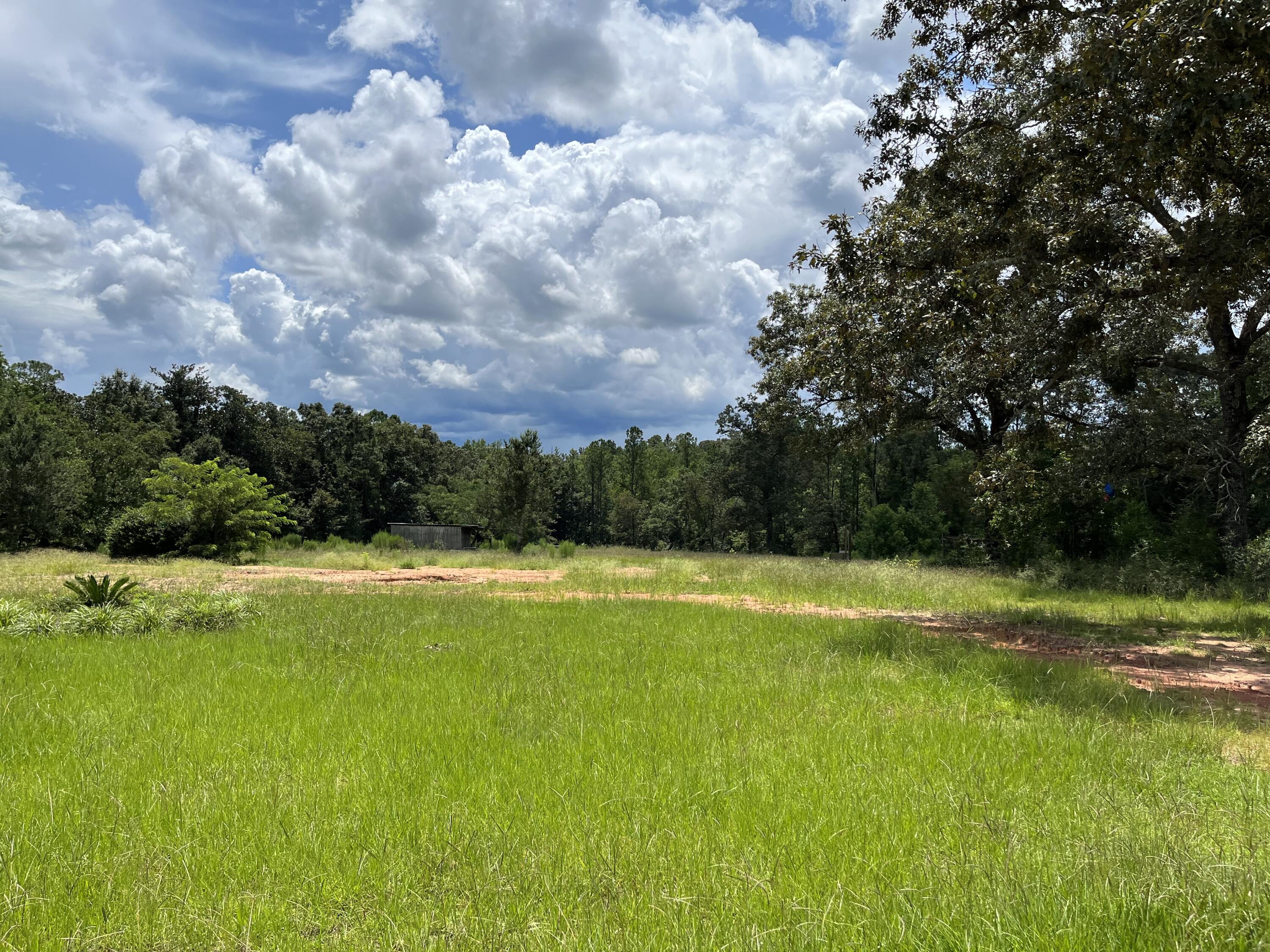 2.5 acres full of nature and quiet. Only 5 minutes to Jay! This home is perfect for the growing family and the outdoor lovers. Originally, there was a home on property that had burnt down. All debris has been cleared and property is being sold AS-IS. Buyer is required to do their own due diligence at all levels. This a great opportunity for a spec home builder to create a luxury house for a picturesque property or a family to build a custom home. With 2.5 acres, think horses and donkeys in your back yard Property is priced below market value for quick sale.