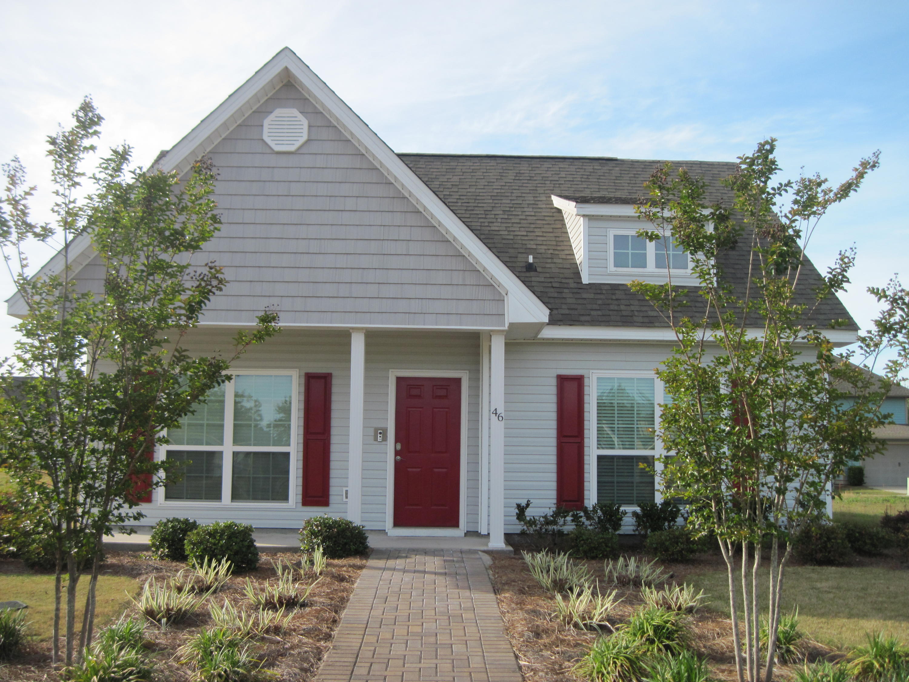 Located in the Schooner Landing neighborhood at Hammock Bay, this home is walking distance to the Hammock Bay amenities center. Interior space includes three bedrooms, two bathrooms, open living area with beautiful new wood flooring, soon to be installed This is a well laid out floor plan. A two car garage provides security and extra storage. HOA, Garbage, Basic Cable, pest control and lawn maintenance included.
  Hammock Bay is a pedestrian-friendly development. There are network of sidewalks, nature trails, and bike paths. . The Hammock Bay Town Square-lawn-style amphitheater is designed for entertainment. There is also a $12+ million, 60-acre Sports Park featuring a multitude of ball field/park amenities nearby. Recently the developer donated land for two schools to be built in Hammock Bay.

The Lake Club at Hammock Bay includes a 25 meter lap pool and a resort-style pool, lighted tennis courts, putting green, $250,000 playground, lighted basketball courts, meeting/functions facility, caterer's kitchen, and 6000 sq. ft. clubhouse with movie theatre. Adjacent to the Lake Club is the Fitness Club at Hammock Bay, a 4000 sq. ft. state-of-the-art fitness facility featuring Body Master Weight equipment and Life Fitness cardiovascular equipment w/flat screen TV's. There is also the Bay Pavilion at Hammock Bay, located on 480 ft. of shoreline alongside the Choctawhatchee Bay. 

Hammock Bay offers a pet park entitled Canine Commons at Hammock Bay. This pet park provides an outdoor doggy-washing station and drinking-bubblers. Hammock Bay is currently one of 600+ communities in the United States that features the most advanced fiber optics technology direct to homes through Centurylink's FTTP (Fiber To The Premise) program, providing capacity for the latest advances in phone, internet, and cable technology. Hammock Bay is located in a Community District Development to ensure the highest quality of infrastructure for years to come. We invite you to come take a tour of this exceptional home and experience first-hand the Hammock Bay "way of life!"