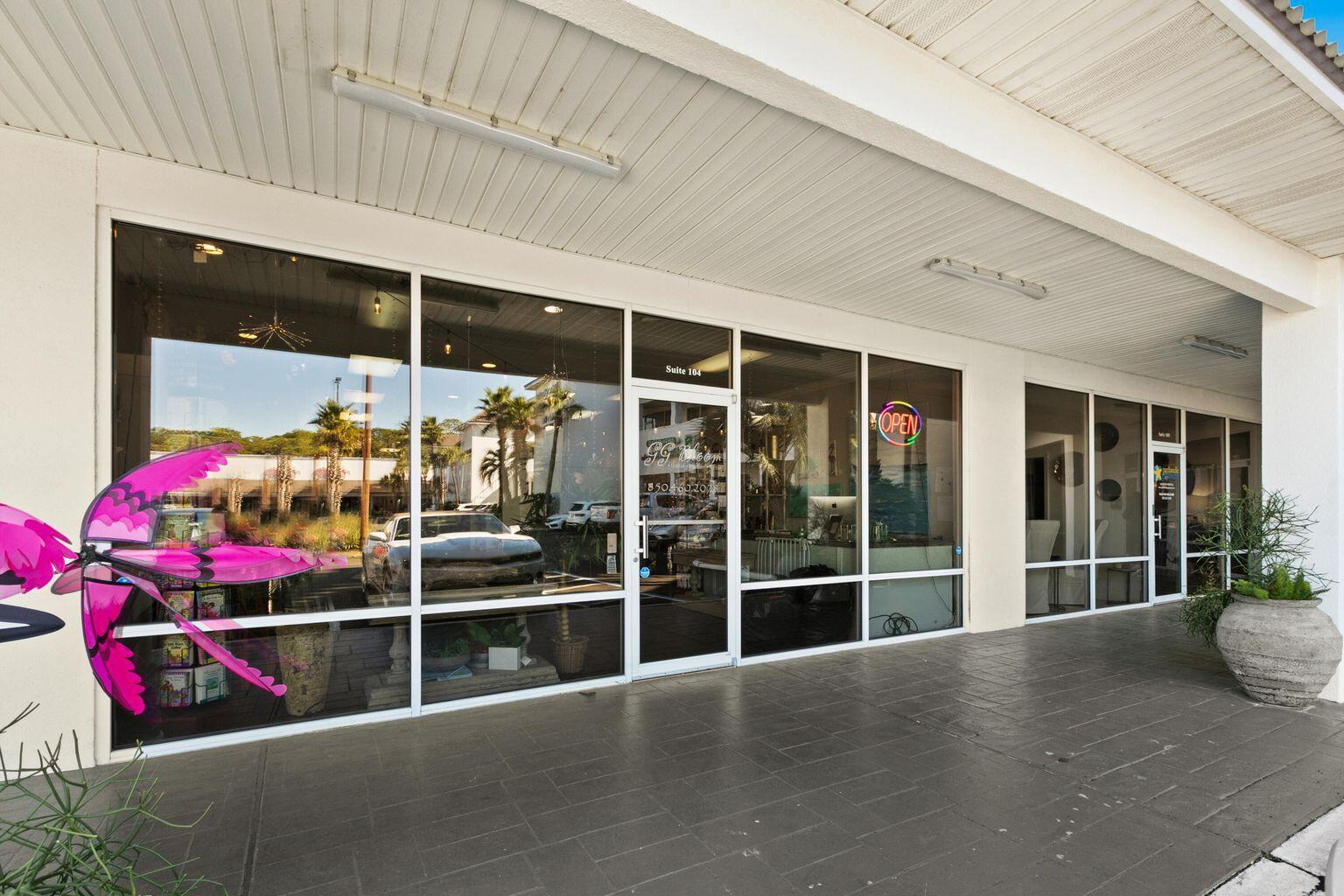 Holiday Plaza is right on Hwy 98 with excellent visibility. 
Lots of parking. Easy entry and exit. 
This unit has a large showroom, workroom currently used as florist area, beautiful restroom, storage, rear driveway for ease of loading or deliveries.