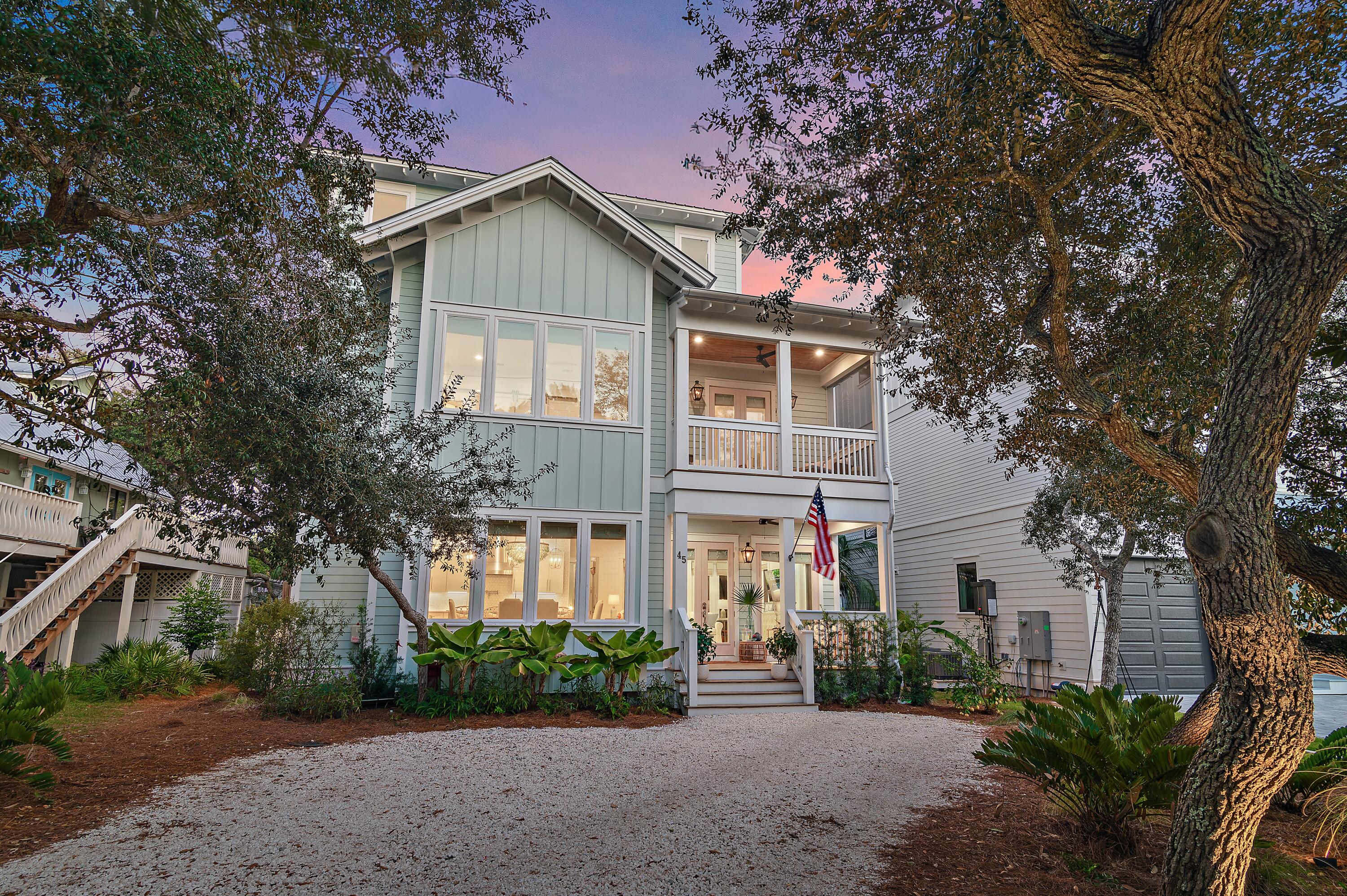Tucked beneath a canopy of mature live oaks on a quiet gravel street in Santa Rosa Beach, 45 May Drive captures the charm of Old Florida while offering the thoughtful craftsmanship and elevated design today's buyers appreciate. Located on the south side of Scenic Highway 30A and within walking distance to the beach, this 4-bedroom, 2,756 square foot coastal cottage was built as the primary residence of a well-known local custom home builder and showcases meticulous attention to detail throughout.

The interior is offered furnished and features curated selections by Canepari Coast Designs, reflecting a refined coastal aesthetic through custom tile work, wallpaper, lighting, and thoughtfully chosen finishes. The kitchen is complemented by a functional scullery, providing additional storage and prep space ideal for entertaining and everyday living. All bedrooms feature en suite bathrooms, offering comfort and privacy for family and guests alike. The flexible top floor living space can serve as a private bedroom, bonus room, or additional entertaining area, providing versatility for full time living or hosting guests.

The outdoor living spaces are a true highlight of the property. Designed for both relaxation and entertaining, the backyard includes a custom outdoor kitchen, tiled outdoor shower, sauna, heated pool, low maintenance turf, lush landscaping, and thoughtfully planned outdoor lighting that creates an inviting atmosphere day and night.

The location further sets this home apart. Enjoy an easy walk to the beach with access to a newly developed county public beach parking area nearby. Local favorites including Old Florida Fish House, Steamboat Grill, and the Shops at Greenway Station are all close by, offering dining, shopping, and entertainment just minutes from home.

45 May Drive offers a rare combination of timeless Florida character, quality construction, and an exceptional outdoor lifestyle in one of Santa Rosa Beach's most desirable settings.