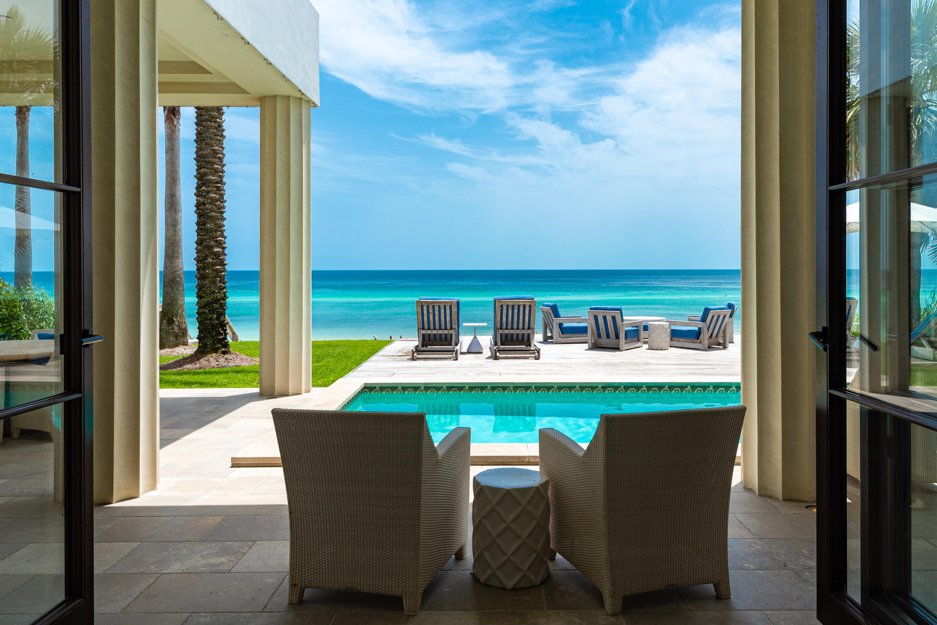 A rare combination of luxury, location and space! Discover breathtaking water views from the moment you enter this stunning 4,446 square foot Gulf front home mere steps from the Seaside community. No detail has been overlooked with incredible craftmanship and finishes such as Italian stone floors, pecky cypress doors and an elegant custom-made staircase. A sophisticated coastal style defines indoor and outdoor spaces that seamlessly blend into one with accordion-style doors creating an expansive entertaining space. A private beachfront pool and spa along with both covered and open outdoor areas provide room to relax and take in the unobstructed Gulf views. This spacious property features 4 bedrooms, each with an ensuite bath, 2 additional half baths and a laundry room on each floor. Enjoy a gourmet cooking experience in the chef's kitchen complete with marble countertops, custom cabinets, state-of-the-art appliances and a scullery. The upstairs master leaves nothing to be desired with its Gulf views, luxurious master bath, private study and roof terrace. With dining, shopping and activities all within walking distance, this Gulf front home offers a spectacular retreat in Seagrove Beach.