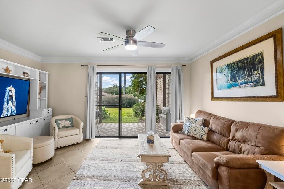 FINALLY, the crown jewel of Portside can be yours! With extensive upgrades and high-end finishes, steps from the pool and in excellent condition. Extremely powerful rental performance, even with frequent owner stays. More about Portside: Positioning is perfect, with a beach access across the street. Not only that, you're in the hottest part of Panama City Beach, with Top Golf, Pier Park, and Pirates Voyage PCB just minutes away. And state and local parks, a massive trail system, and iconic 30A are all within a 15-minute drive. If you're looking to maximize rental income in this market, this unit is ideally sized. Smaller units are book quickly, and they are more likely to rent even in the fall and winter months.  In fact, this unit is already booked for three months this winter at $2500 monthly -- rentals that can transfer to you if desired. You have to view this unit in person to truly see what sets it apart from the rest. From the crown moulding to the baseboards, from the granite countertops to the ceramic tile floors, this home feels comfortable and luxurious all at once. It's literally ready for you to walk in and start living there, vacationing there, or renting for income. The photos are great, but they don't do it justice. Schedule your personal showing today before another smart buyer beats you to buying this exceptional beach home.