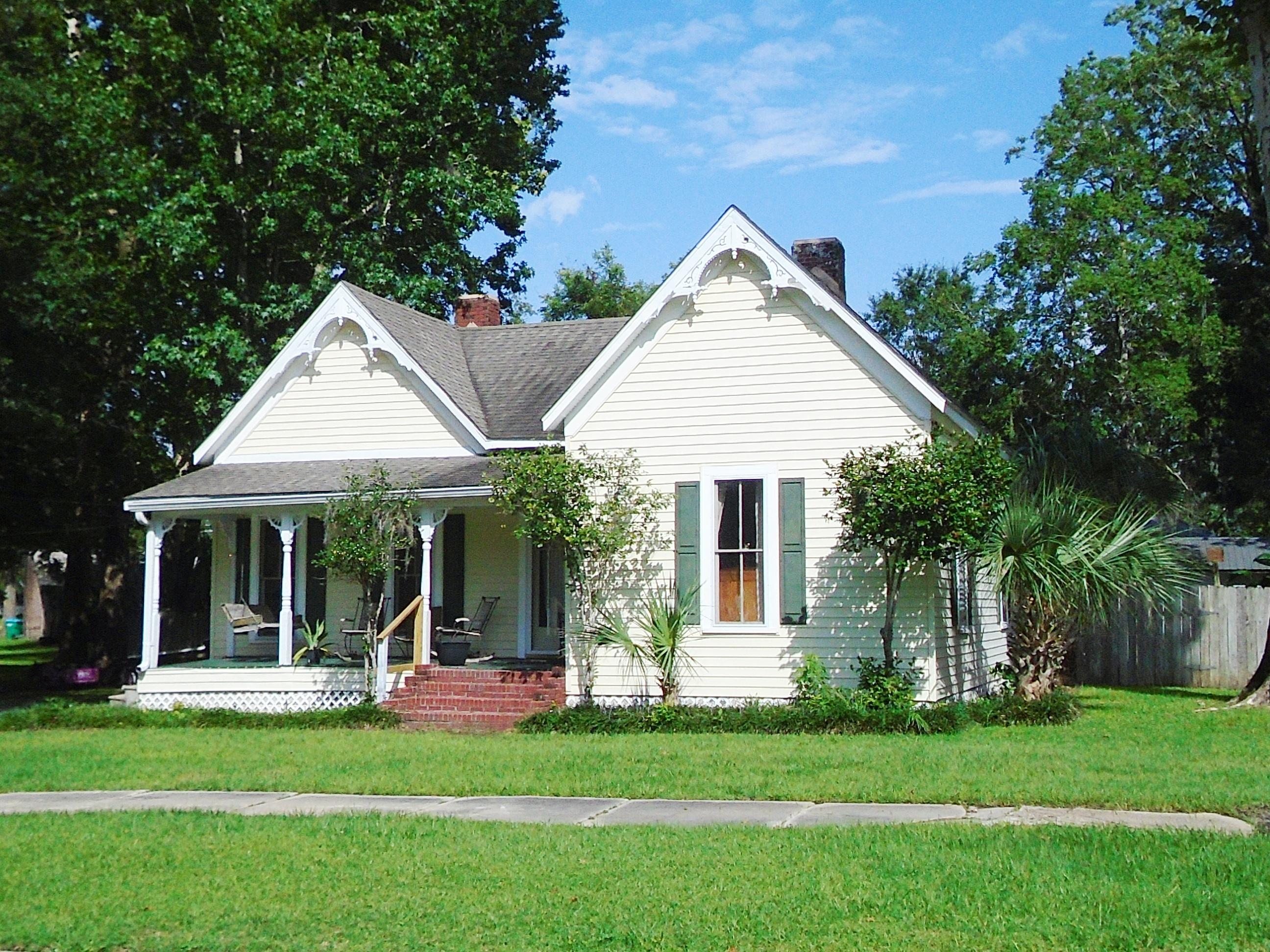 NEW PRICE!!! LOCATED 2 BLOCK FROM LAKE JACKSON AND 1 BLOCK FROM THE NEW PLAYGROUND, THIS BEAUTIFUL HOME OFFERS PLENTY OF SPACE AND TONS OF EXTRAS. HOME WELCOMES YOU WITH A GREAT COVERED FRONT PORCH PERFECT FOR RELAXING, LARGE LIVING AND DINING ROOM AND 2 AMPLE SIZE BEDROOMS ALONG WITH A GREAT SIZE KITCHEN, PLUS AN ADDITION FAMILY ROOM THAT ALLOWS YOU TO EXIT TO THE BACK DECK AND IN GROUND POOL! HOME HAS A PRIVACY FENCED BACK YARD AND INCLUDES A LARGE STORAGE BUILDING ALREADY EQUIPPED WITH POWER AND PLUMBING FOR A FULL BATH, GREAT FOR AN APARTMENT OR POOL HOUSE. HOME HAS BEEN WELL MAINTAINED AND IS MOVE IN READY!