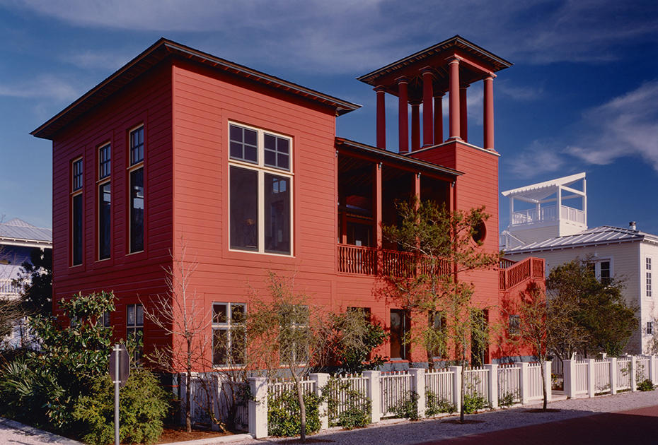 Watch your Seaside white picket dreams play out in this one of a kind home brought to life by renowned architect and designer, Charles Warren, which transports you from the simple louvered double door entry up to the eight majestic Tuscan columns that create the perfect rooftop pavilion and deck to take in the breathtaking Gulf views. A quintessential mix of Seaside's urban design and Roman architectural ideals, this well-thought out 2,108 square foot estate creates a perfect mix of pleasure and efficiency; offering expansive interior and exterior living space to revel in within the homes facade. With beautiful hardwood floors throughout the home, the first floor offers a spacious master suite with direct access to an enclosed porch, an additional master suite, and laundry room. Natural light abounds the home's kitchen located on the second floor offering a center island with a breakfast bar, large pantry, a Sub-zero fridge that blends perfectly into the homes dÃ©cor, and a half bath. The expansive dining room features coffered ceilings, ornate details and the perfect space to entertain guests. This room carries you through to the home's great room featuring large picture windows, transom lights, wainscoting and soaring ceilings throughout the space. Both of these rooms offer access to the open loggia, all together creating the classical piano nobile level of the home overlooking Seaside's West Pool and park. From the open balcony, where relaxation is achieved, a sweeping staircase takes you up the exterior of the home to the perfect rooftop perch meant for enjoying a beautiful Seaside sunset. Adjacent lot to the home is also available for sale and creates the perfect opportunity to add on or build a separate structure. This classic Seaside home that's been featured in various books and magazines is a must see!