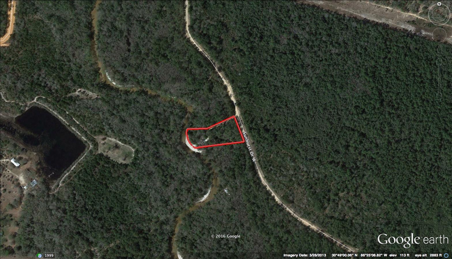 A Hunter's paradise! Approx 40 acres. Very nicely wooded. Maybe a small pond. There is a good bit of timber. Zoning is agricultural. Part of property is in 100 year flood zone. There is a Homeowner's Association, $100 per year. If you like hunting, camping or just walking in the woods, you will love this property. Back of the property is a creek!