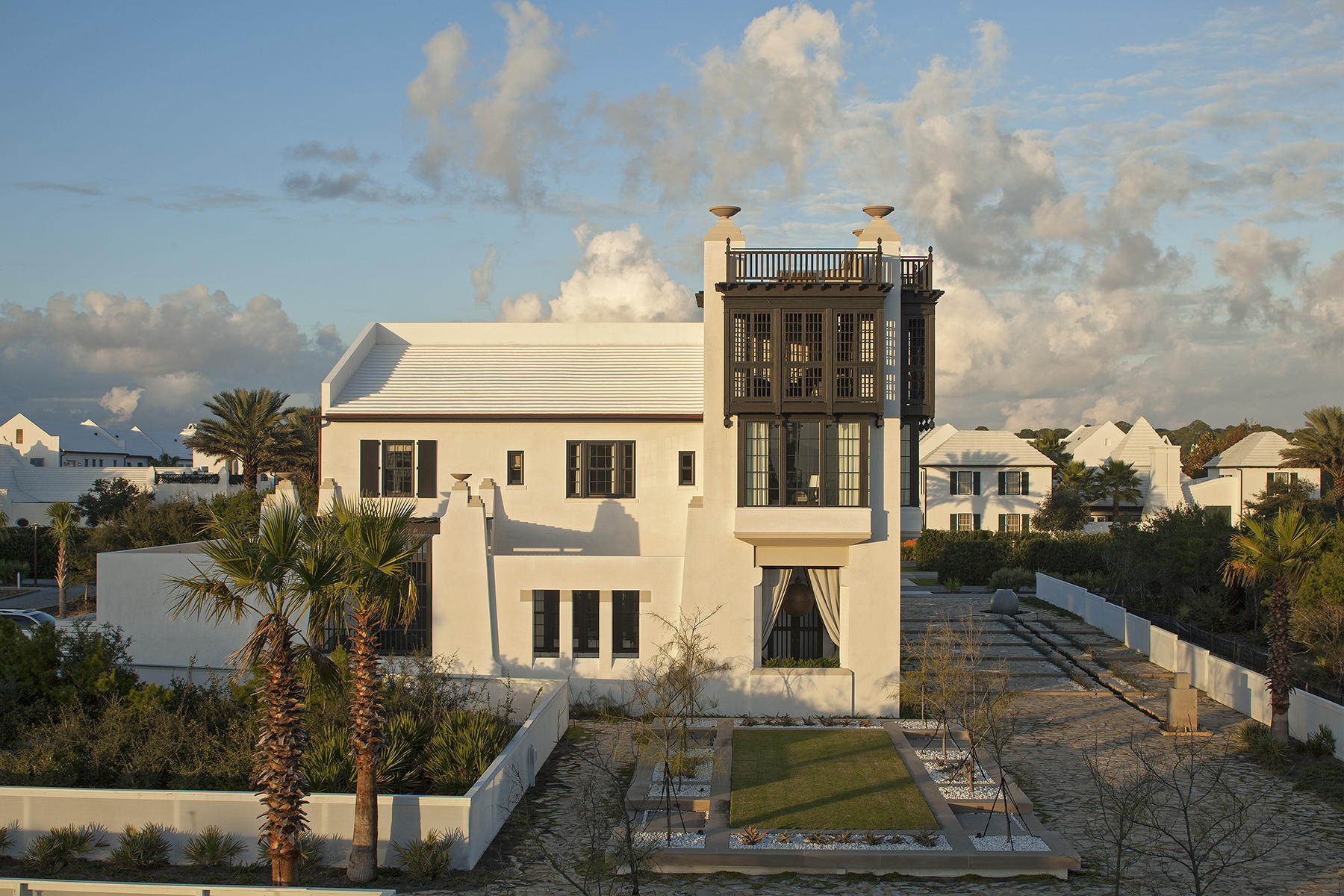 This 3 bedroom, 3.5 bath Mediterranean celebrates an al fresco lifestyle and offers the same level of escape. Located on the Beach Side of Alys Beach, the home features a 4 story tower with unparalleled views of Sea Garden Park and the Gulf of Mexico. Throughout are rich textures, natural elements, and a mix of old world antiquity with modern touches. The first floor great room with powder room and adjoining kitchen feature 13-foot ceilings. Just beyond is a gracious landscaped courtyard with a heated pool, 2 loggias overlooking South Sea Garden pedestrian path, and an al fresco dining court. 3 bedrooms with 3 baths, a ''secret'' bunkroom are located on the second floor. Panoramic southerly views come with the master suite and the open air Florida room above, both. Topping it all off is a fourth floor rooftop terrace.