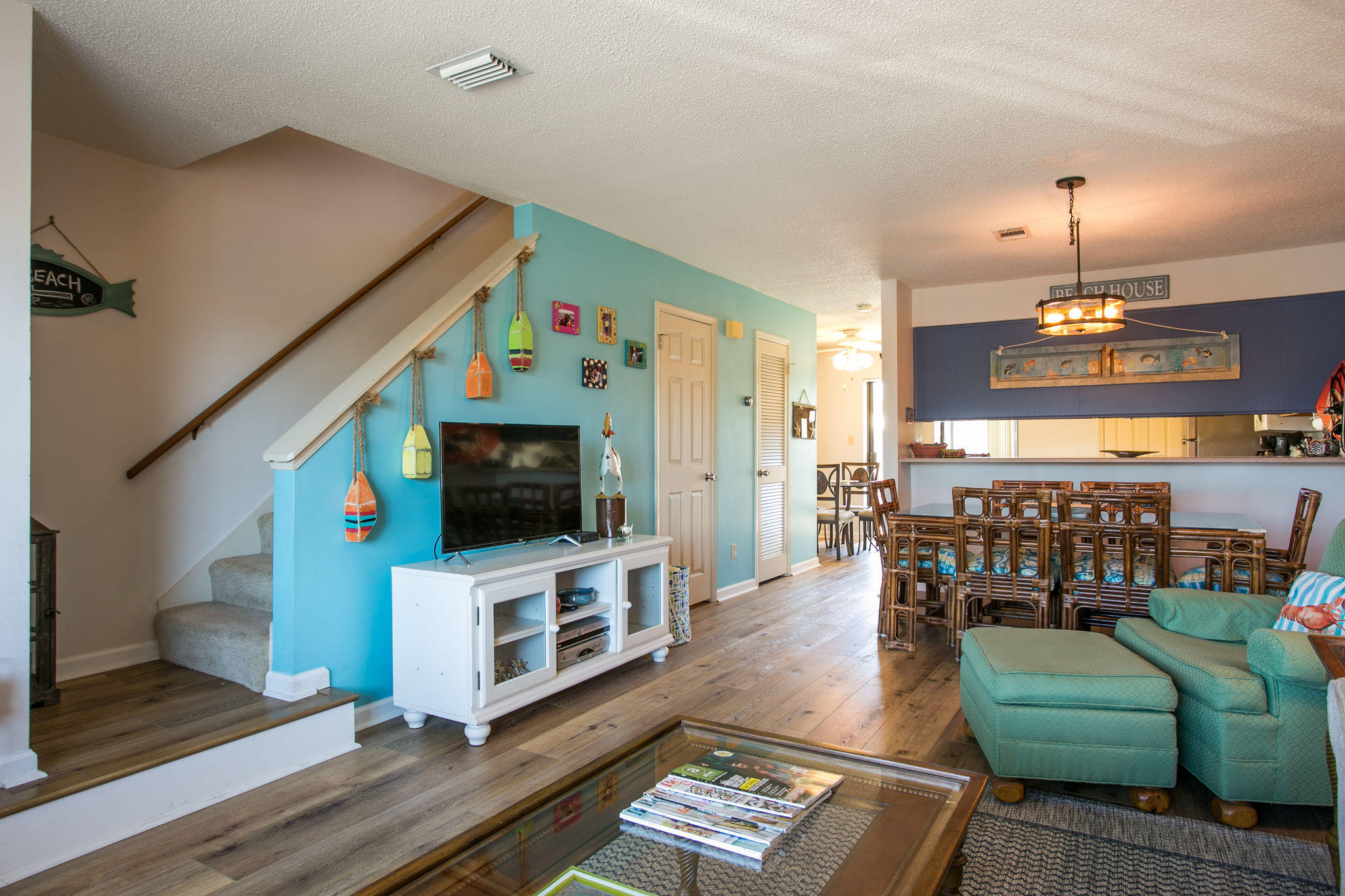 Walk to the beach!! This spacious 2 bedroom floor plan condo has been decorated in fun beach colors. With living, dinning, half restroom and kitchen on the first floor. Two bedrooms and two full bathrooms on the second floor. Private patios located from the master bedroom and kitchen. Nicely updated condo with new luxury plank water and sound proof flooring in a beautiful pine finish. Guest bathroom with new mirror and furnishings. Kitchen decorated with wood accent wall. Recently painted. Nest thermostat for easy adjusting remotely. Rare find and a must see!! Great rental investment property or second home and just a short walk to the beach!!
