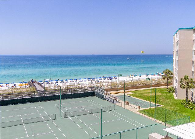 RENOVATED and upgraded 5th Floor 2 bedroom 2 bath GULF FRONT unit, one of very few with its own (newly installed) Washer/dryer and master bedroom walk in tiled shower! This unit features new Hurricane impact sliding glass patio door and Gulf front windows, lockable owners closet, all tile floors, granite counter tops throughout, a fun and beachy feel with a spectacular view of the pool and the Gulf. This gated condo complex features 24 hr security. This unit is perfect for anyone looking for a turn key vacation rental, second home, or primary residence. Located on prestigious Holiday Isle on the white sand beaches voted as the best in the USA! Exterior renovations including new balcony railing, exterior painting, walkway recoating,and new balcony tile are completed/under way. Act Fast!