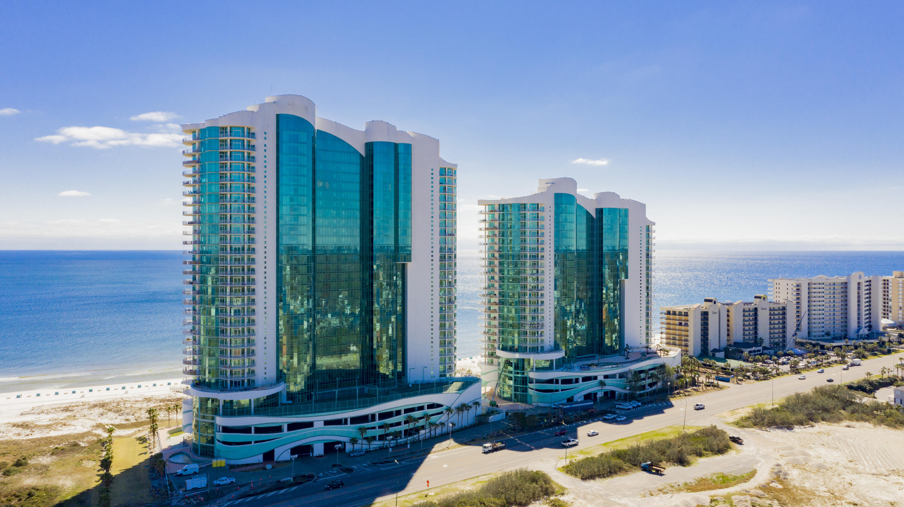 Welcome to Turquoise Place C1904 - the luxury condo of your dreams!  This 3-bedroom, 3.5-bath unit boasts amazing views of Perdido Pass and unbelievable views of the Gulf of Mexico.   As a fully furnished, luxury residence, you can expect high end furnishings and décor!  The condo has $32K in brand new, upgraded furnishings from MINT Décor & Design, one of the top designers in the area, that adds to the amazing appeal of the unit.  Another additional bonus to note is the carpet replacement – new carpet was just installed in May!  With these upscale furnishings, upgrades and prime location, this property has great rental return as an investment with projected rental income at $117k for 2021.  The private balcony with hot tub also includes a gas grill which is among the many amenities of the among the many amenities of the unit including granite countertops, tile, crown molding, gas fireplace, and Subzero/Wolf appliances with a wet bar and wine cooler.  Truly an all in one residence. The sunsets and incredible beach views is everything and more, but that's not all - Turquoise Place has an abundance of amenities; 5 Pools including 2 heated indoor saltwater pools, zero-entry outdoor pool with live entertainment during summer, outdoor pool (East tower), a long lazy river, on-site bar & grille, tennis courts, and children's playground. You can have it all and experience it all at Turquoise Place C1904.  Call today for your private showing and see for yourself everything that could be yours.