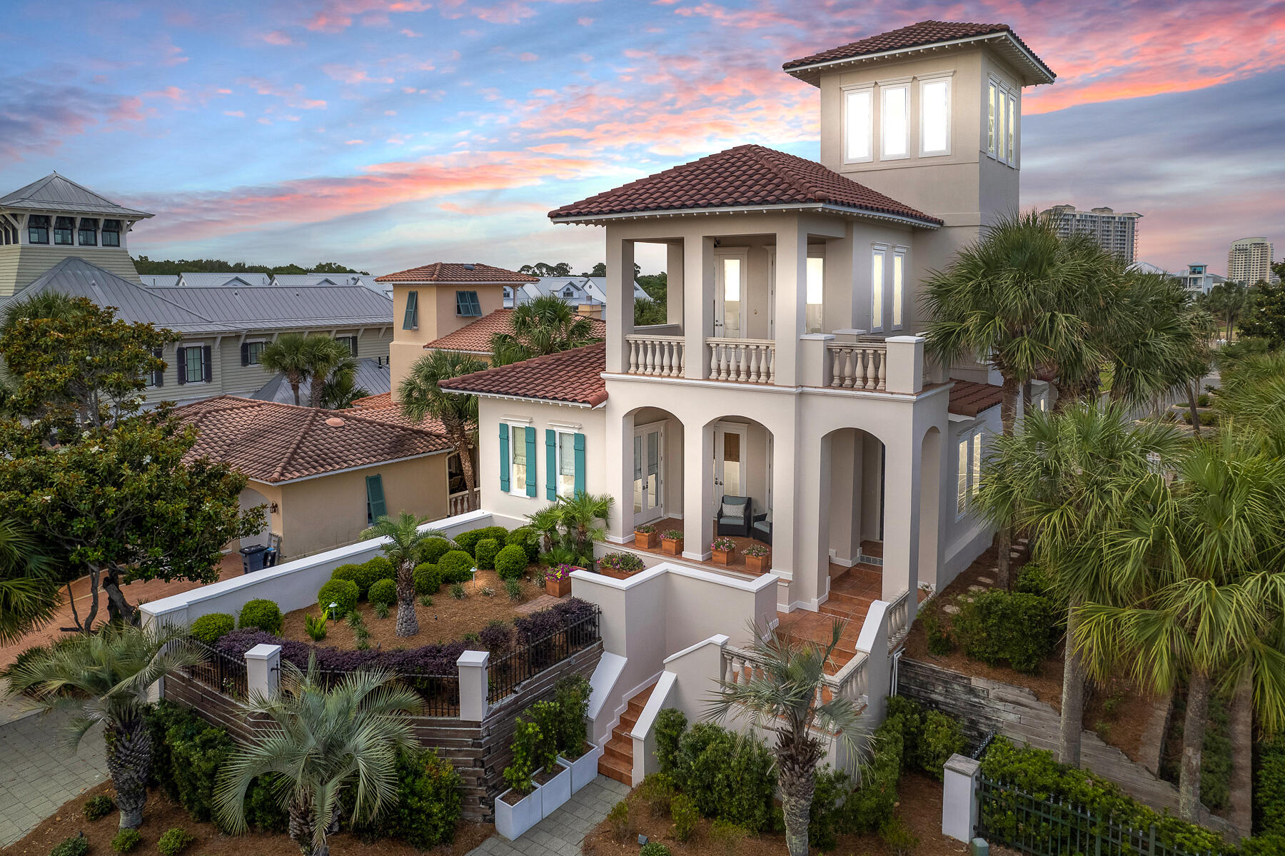 No detail was overlooked in this expanded, meticulously remodeled and structurally enhanced mediterranean style home. Located on the third tier in exclusive gulf-front Caribe, this furnished retreat boasts prime access to the gulf with the allure of a private escape. Step onto the boardwalk from the back porch to access the low-density, snow-white beach deeded for neighborhood residents.
Inside the main house, three spacious bedrooms all with en suite baths and a luxurious master suite invite effortless relaxation. A third floor enclosed lookout level offers 360 degree views of the breathtaking horizon through 12 Jeld-Wen Atlantic Coastal windows.  The well-equipped kitchen has open shelving, a gas cooktop, and a wine refrigerator. Guests enjoy a rare, separate casita equipped with a full bath and kitchenette. The outdoor shower and boardwalk entrance areas were re-constructed with stone pavers, and new Trex decking was installed on the rear and side deck areas. All interior walls, ceilings, and trim, and all exterior surfaces have been painted, while lush surrounding grounds boast new lighting and irrigation systems. 365 Rue Caribe is being offered fully furnished with a few exceptions.

Caribe is a guard gated, private gulf front neighborhood conveniently located near Grand Boulevard in South Walton County. Caribe's private beaches offer daily chair service and endless sunsets. Two neighborhood pools, tennis courts, lush landscaping, Caribbean style architecture and friendly neighbors are included in low HOA fees. Caribe neighborhood allows vacation rentals with limitations on occupancy. It offers the best of both worlds, quiet privacy and opportunity for rental revenue. While only about 25% of the homes are on the vacation rental market, the opportunity to realize income is an added bonus. Make an appointment to see this well-appointed home today. Consider Caribe as your next destination.