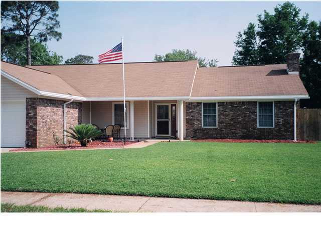 Great in town location that is close to the mall, schools and covenient to Hurlburt Field. Wonderful yard with open patio. Interior features a woodburning fireplace, newly remodeled kitchen, ceiling fans, ceramic tile,carpet and window blinds. Playground close by. Small pet may be considered with a Non-Refundable Pet Fee. No smoking inside home or garage.