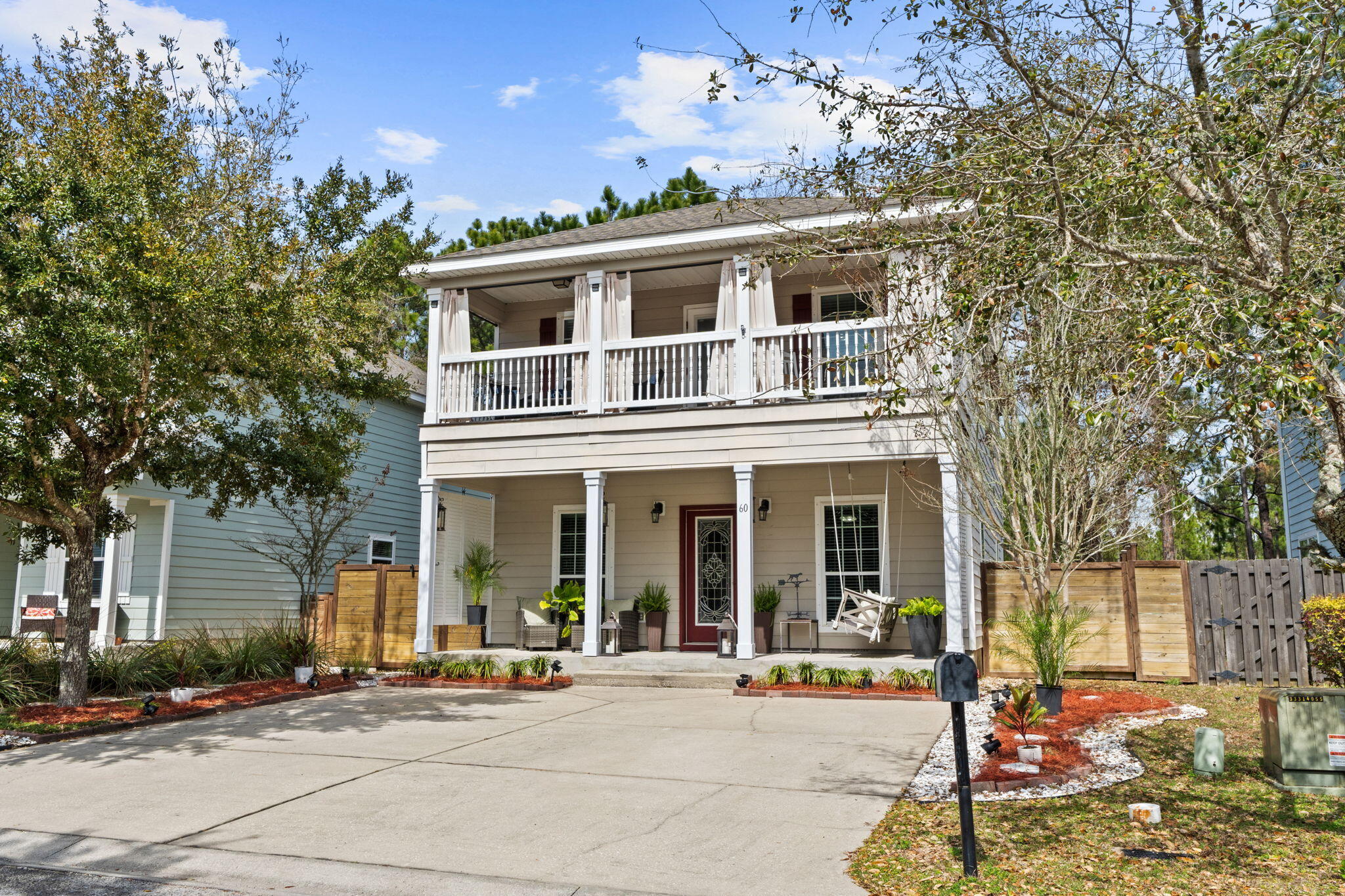 UNDER CONTRACT - ACCEPTING BACKUP OFFERS. Located in the charming community of Mosaic Oaks in Santa Rosa Beach, this coastal home offers smart functionality, generous storage, and one of the largest backyards in the neighborhood - all with an ultra-low $50/month HOA. 

Classic double covered porches define the exterior and create timeless coastal charm. Inside, engineered hardwood floors and calming hues complement the open-concept design. The kitchen offers granite countertops, a spacious breakfast bar, expanded pantry and effortless flow into the dining and living areas. Upstairs, you'll find the guest bedrooms, a hall bath, and a spacious primary suite with a glass-enclosed tiled shower and private access to the second-floor balcony. Situated on an exterior lot, this private backyard retreat features an expansive wood deck surrounded by lanterns and creates an inviting setting for entertaining or quiet evenings under the trees. 
Enjoy the best of coastal living from Bay to Beach. Just minutes to Choctawhatchee Bay access at Kellogg Bayside Park and Cessna Landing for paddleboarding, kayaking, and boating, and only 10 minutes to Ed Walline Public Beach Access and Gulf Place along Scenic Hwy 30A -- placing South Walton's beautiful beaches, local dining, and boutique shopping within easy reach.