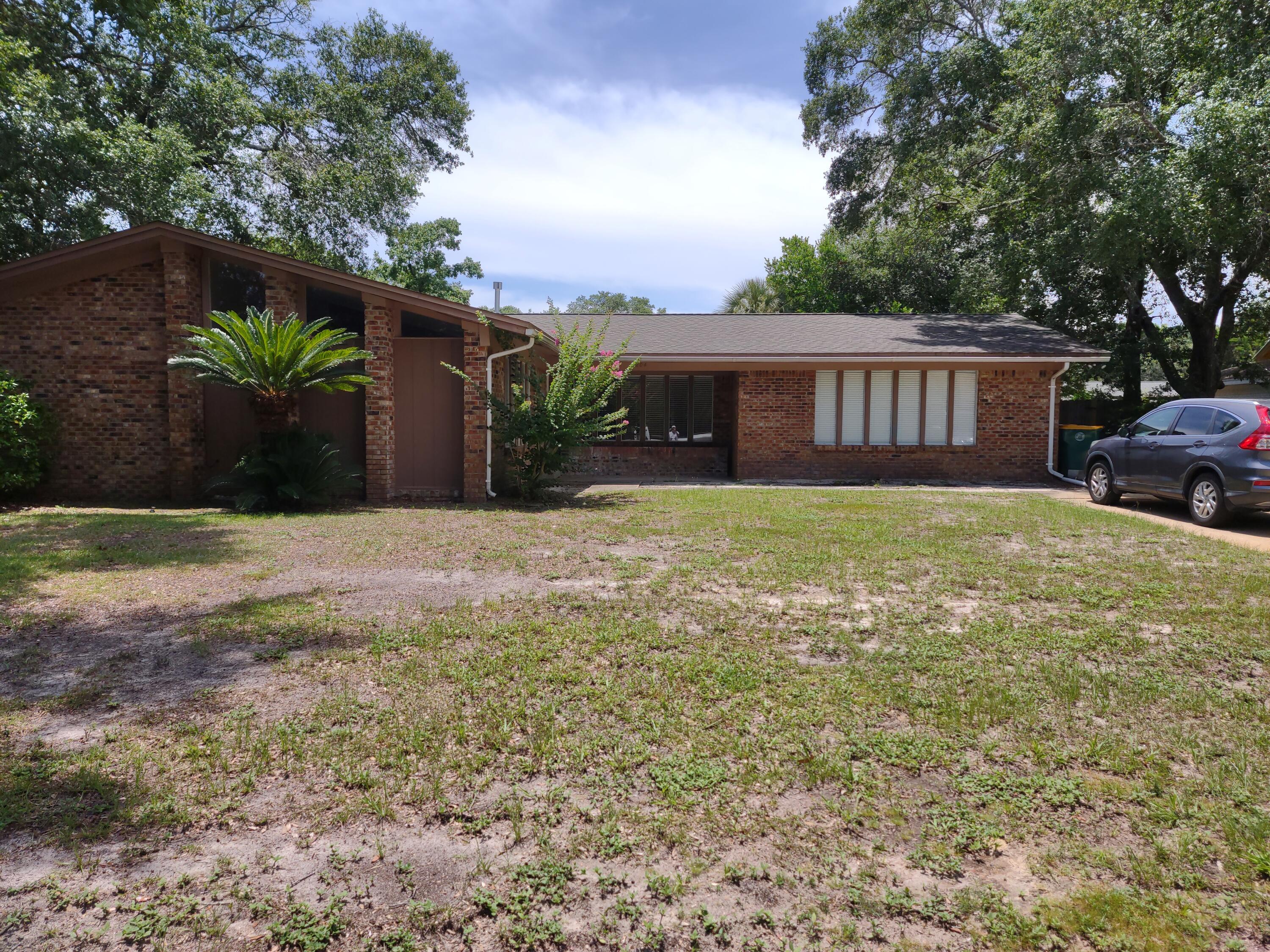This wonderful four bedroom home in Overbrook is located in a Cul-de-Sac and convenient to both Hurlburt and Eglin bases. The current owner has completed so many upgrades. The wiring system has been upgraded to copper and extra detail went into design the wiring to assist in future needs if necessary. The sparkling pool has a approximate 7 year old upgraded liner and multi-speed energy efficient pool pump. The water heater system has been upgraded to a tankless gas system. The carpet is upgraded, the Kitchen has been upgraded, the master bath has been updated with new shower, custom tile work and fixtures. Roofing system upgraded about 8 years ago. Even the Florida/pool room has been upgraded. Along with these and other upgrades, this wonderful property offers a workshop.