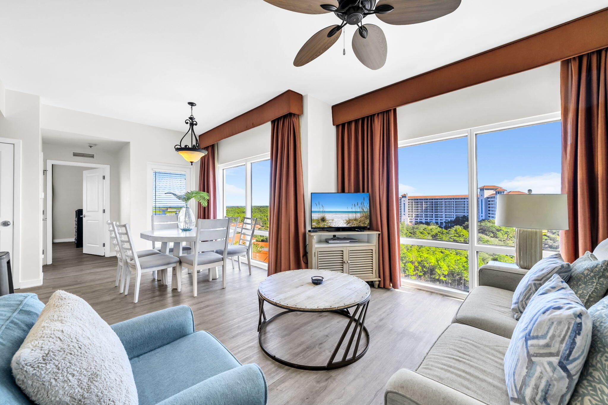 Incredible location, panoramic view and outstanding rental potential! This 9th floor condo provides the perfect beach escape with eastern views, new flooring, new paint, new designer furnishings and New HVAC 2021-2022. This two-bedroom lock-off offers maximum flexibility as it may be rented as a 1 bedroom and Studio or a 2 bedroom condo. Soak in the in majesty of the Gulf of Mexico from your private wrap around balcony which also provides a birds eye view of the Choctawhatchee Bay! Luau amenities are plentiful including an inviting heated lagoon pool with waterfalls, adult hot tub area, children's pool, tiki hut and fitness center. Luau also offers a rooftop sunset deck, barbeque pavilion, covered parking and owner storage area. Sandestin's private beach, championship golf courses, multiple swimming pools, marina, walking and biking trails, and the vibrant dining, shopping, and entertainment at The Village of Baytowne Wharf. Whether used as a primary residence, second home, or vacation rental, this property provides exceptional flexibility and investment potential in one of Miramar Beach's most sought-after communities.