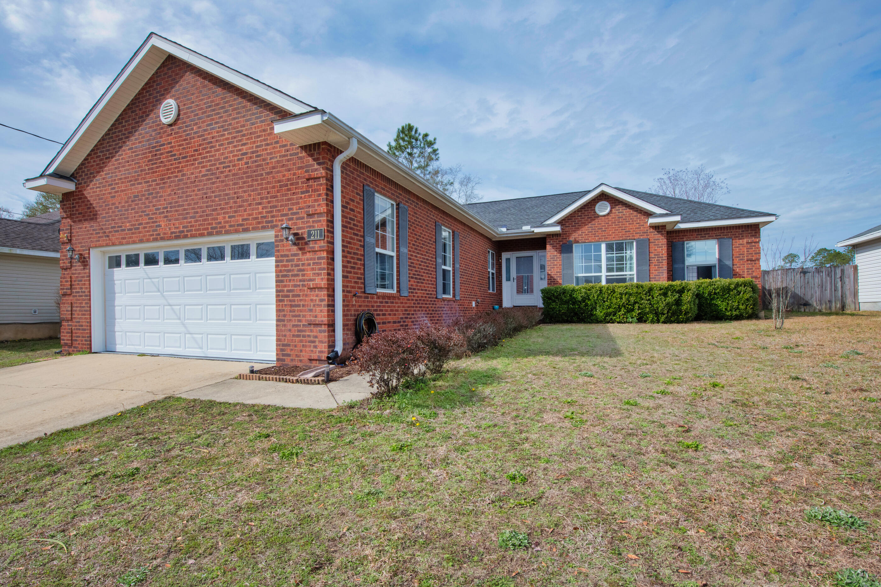 UNDER CONTRACT - TAKING BACKUP OFFERS.  This brick and vinyl home has so many features, it'll be hard to decide what you love most! Stretch out and enjoy the split floor plan with 9' ceilings, 3 bedrooms, bonus room (office, media room, or play room), electric fireplace with shiplap accent wall, mud room with wainscoting, heated and cooled sun room, non-slip epoxy floor in garage, 12x12 shed, roof (2017), HVAC (2016), sprinkler system, and fenced back yard with patio! The main bedroom has a tray ceiling and walk-in closet, and its bathroom has a large soaking tub and separate shower. Two other bedrooms share the 2nd bathroom. The kitchen features solid wood cabinets, pantry, tile backsplash, new disposal, and black appliances (fridge does not convey). Great neighborhood off Hwy 90