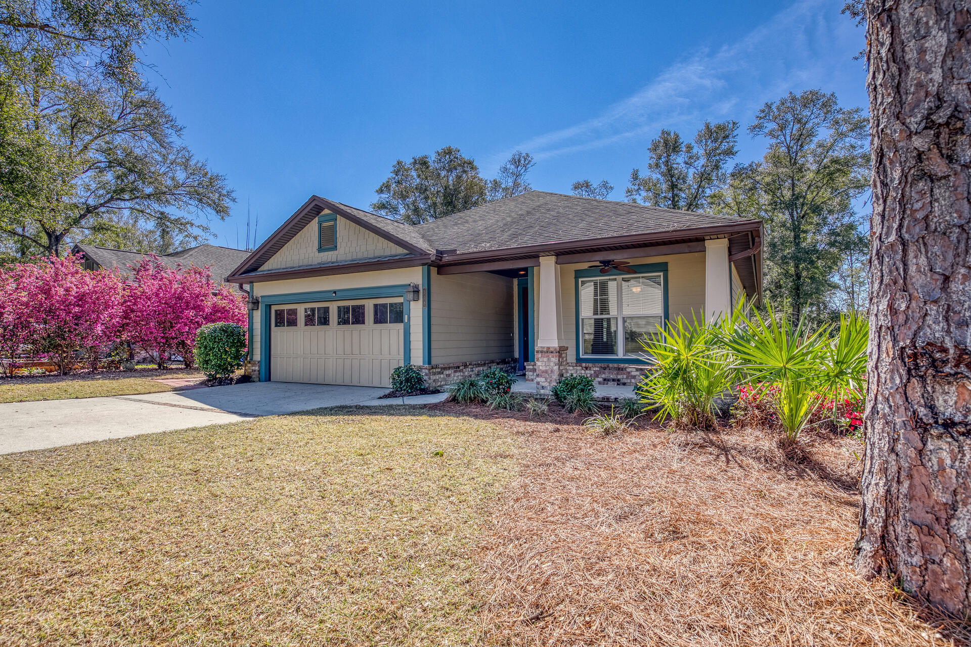 Wow! This one is a must see. Tile floors throughout, 10-foot ceilings, 8-foot doors, granite, stainless and clean! Beautiful yard with citrus and jasmine! This well-maintained Huff built home in The Canopies of Freeport is MOVE IN READY!  Located minutes from everything the Emerald Coast has to offer, this home is situated a corner lot with newly fenced backyard, screened back porch. The neighborhood pool is nearby however, this large lot has plenty of room for a private pool. Do not wait to schedule your tour!