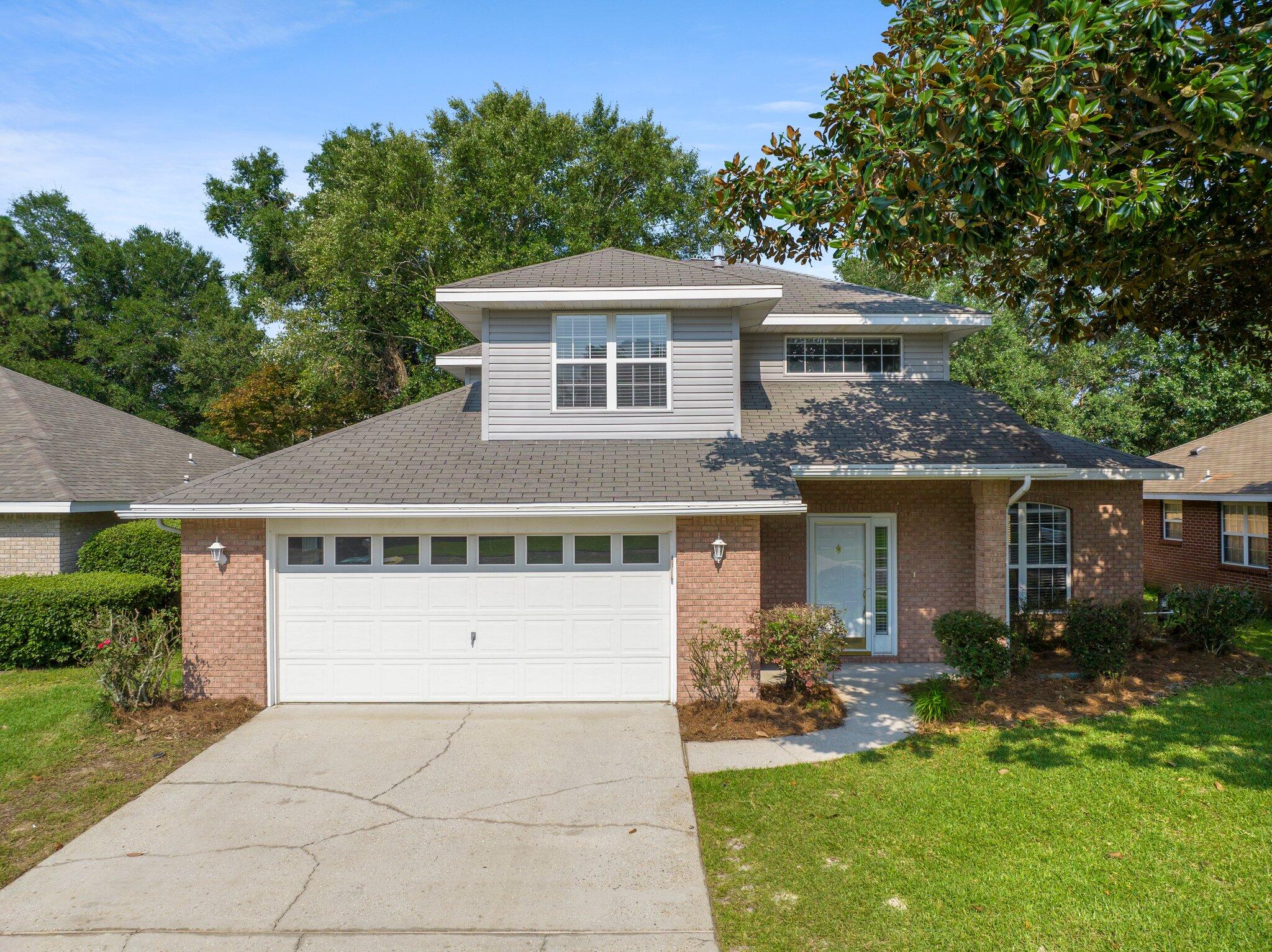Available NOW...This is a great home in an ideal location! Award winning schools, parks, athletic fields and the library are just a few blocks away. The freshly painted open floor plan features a flex space that could be used for dining, an office or a second living area. Leading into the great room, the gas fireplace is the focal point while the high ceilings provide a light and airy feel. New luxury vinyl plank flooring has been installed throughout the main living areas. New carpet in the bedrooms. The eat-in kitchen has tile floors and plenty of cabinets and counterspace. A half bath and laundry room are also located on the first floor. The master bedroom has a large walk-in closet, adjoining master bath with double sinks, garden tub and a separate shower. Upstairs you'll find two  two additional bedrooms as well as another full bath. Don't miss the screened porch overlooking the private fully fenced back yard. If you're looking for an updated home in an IDEAL location...call to schedule your showing today!!Owner will consider pets with restrictions. Any pet must be spayed/neutered, housebroken and current on all shots. Requires a non-refundable pet fee. Any person at least 18 years old must apply separately. Tenants required to carry renter's liability insurance. Ice Maker not warranted