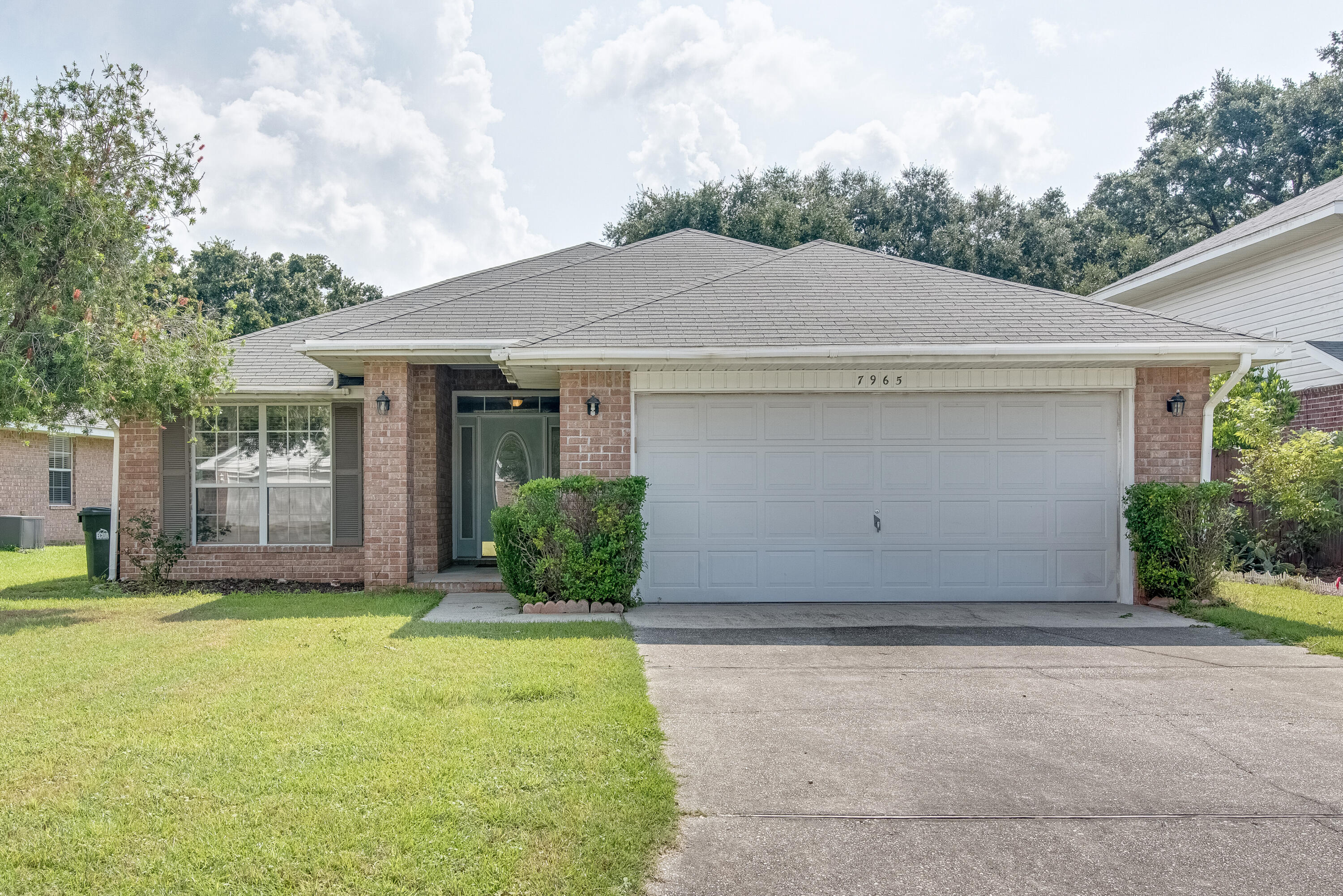 Great location!! Conveniently located!! Quick commute to the back gate of NAS Pensacola, Saufley Field and Corry Station!! Under 30 minute commute to the Beach, Airport, Shopping, and Downtown. 

This all brick, open concept split floor plan is functional and versatile.  Four bedrooms, two baths with a two-car garage.  Large kitchen with island, ample cabinets and breakfast bar. 

The covered screened in patio gives extra outdoor living space to enjoy.
