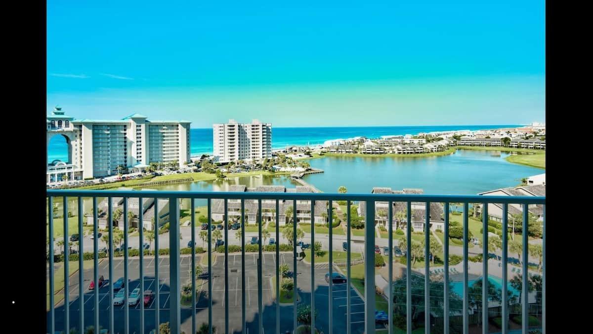 Great panoramic views from this 12th floor one bedroom/one bath unit. The kitchen boast granite countertops and dark wood cabinets. New floors in living room, kitchen and bedroom. The one bedroom floor plan sleeps six with a pull out couch in the den and hall bunks. Ariel Dunes II features three large pools totaling 12,000 sq. ft.Ariel Dunes II is in Seascape Golf and Tennis resort - a gated community offering amenities such as golf, tennis, and conference center as well as deeded beach access to over 2,000 ft of beautiful white beaches. Ariel Dunes II has some of the best views in all of Destin!