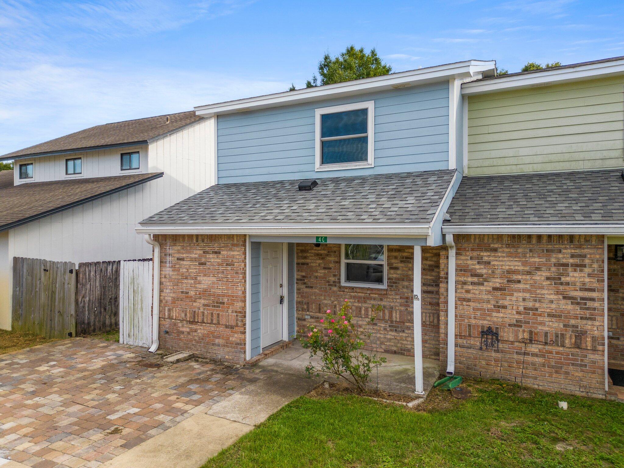 This beautifully updated end unit townhouse has everything you need. Located just down the road from both Choctawhatchee High School and Pryor Middle, and convenient to military bases, the commute is ideal. Recent upgrades include LVP floors throughout, modern kitchen cabinets, appliances, and fixtures. A stylish barn door separates the spacious laundry on the main level and a half bath round out the main floor. The second level hosts the primary bedroom complete with a tasteful ensuite bath and custom closet as well as the second bedroom. A privacy fenced yard, the ideal space that's all your own includes a covered, paved patio and additional storage for yard equipment. Location and upgrades make this space one to snag! Call for your showing today!!