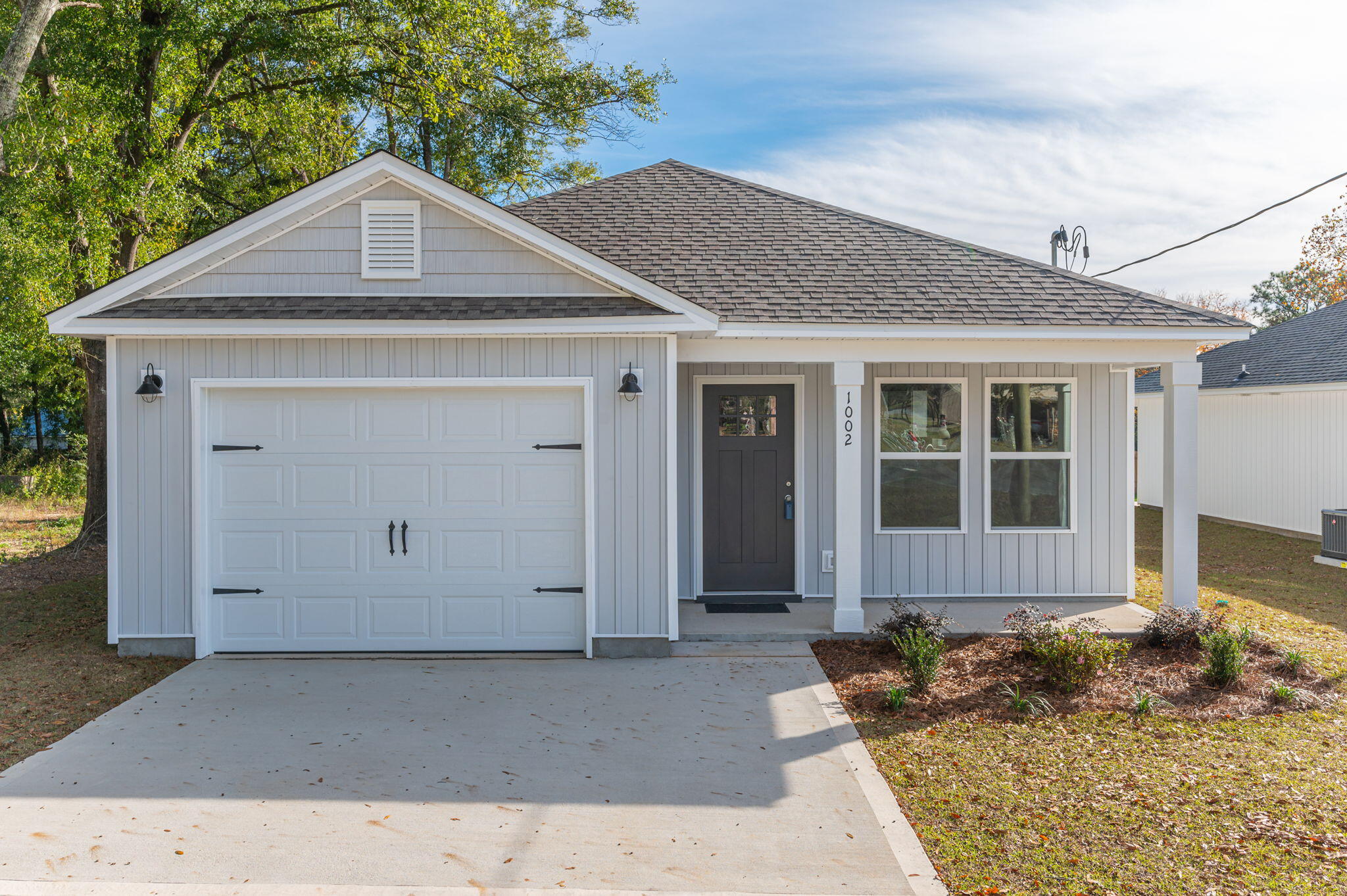 BRAND NEW AND READY TO MOVE IN TO - Open floor plan with Luxury Vinyl Plank flooring throughout! White shaker style cabinets, quartz countertops, stainless steel appliances, pantry, nice size laundry room, covered front porch and rear porch for relaxing.  Owners suite and bath feature double vanities, walk-in closet and good size bedroom.  Seller will pay $8,000 towards buyers closing costs and prepaids with his preferred lenders  (restrictions apply) - call for more details!