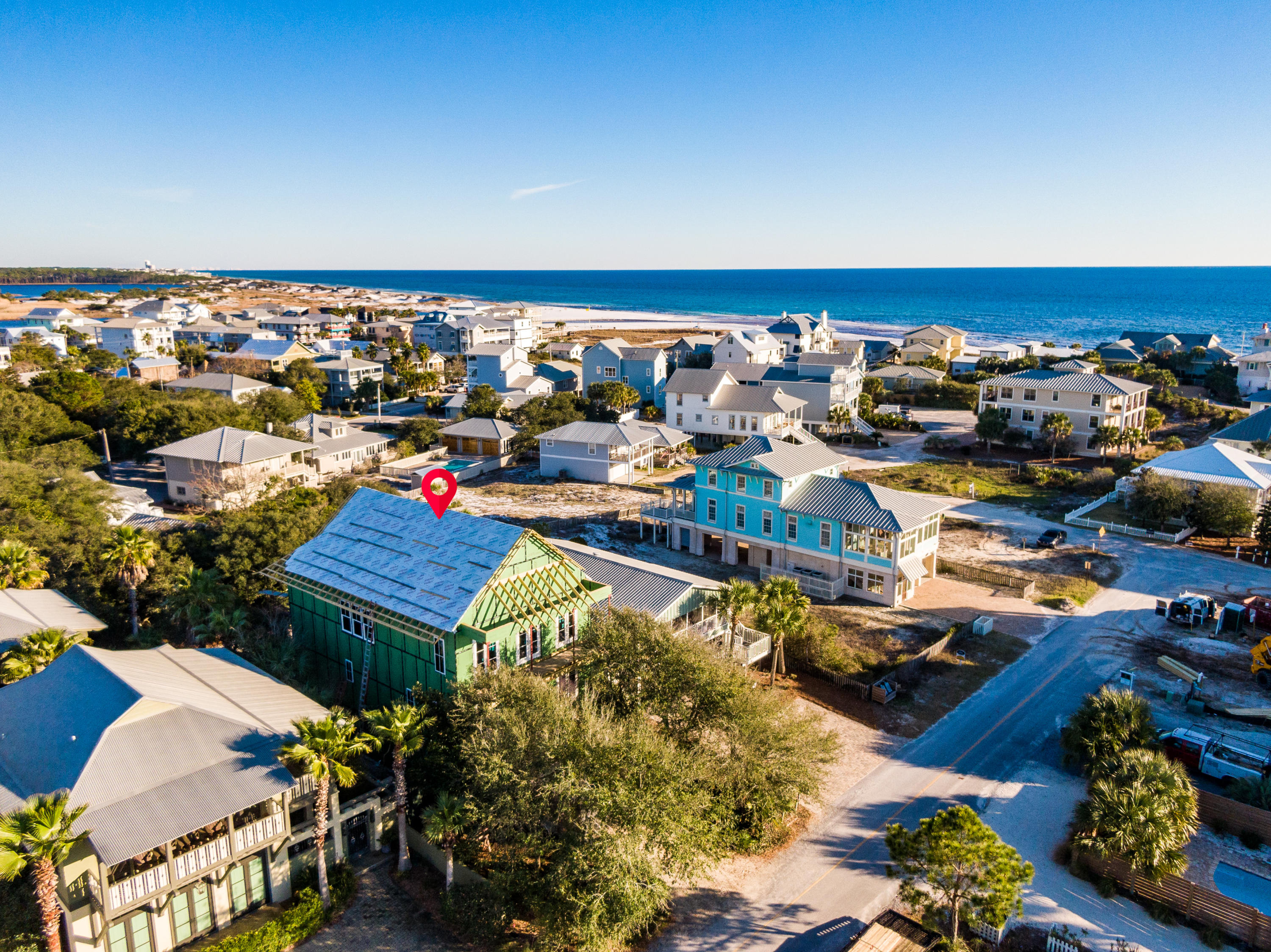 Welcome to historic Grayton Beach, the BEST BEACH for 2020. This new construction by Logan & Logan Construction Co. is located on Magnolia Street. The peaceful and private west side of Grayton is just steps or a bike ride away from various beach accesses, shops and restaurants. It is the PERFECT LOCATION. This coastal gem will be completed in the late Summer of 2020. The property is graced with spectacular oak trees that create a private and intimate oasis. The home boasts 4261 sf on 3 levels, with two living areas and 5 bedrooms, including 2 master bedrooms, 5 & -1/2 baths plus a bunk area with a private pool. Custom hardwood floors/tile throughout. The spacious 3rd floor offers spectacular Gulf Views, complete with vaulted ceilings, and a fireplace. Soak up the warm Florida breeze on the multilevel porches. An elevator provides quick and easy access to all three floors. The home has a two car garage and provides plenty of parking. Inviting windows and expansive doors create an intimate welcome.