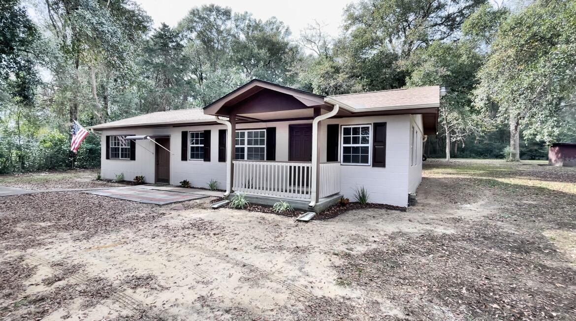 Back on the Market No Fault of Sellers! ...Enjoy Country Living in the City Limits on your own Secluded 1+ Acre LOT! Super Cute 3 Bedroom + Office / 2 Bath Home on a Property Zoned Single & Multi-Family Residential, supporting Multiple units. Increase the Size of your Existing Home / Add an Olympic Size Swimming Pool / Add a Detached Garage or Guest House / Tear down the House & Build Multiple Properties.... the Possibilities are Endless!~ Features & Updates include:  2018 Dimensional Shingle Roof / 2020 AC & Heat / 2015 Hot Water Heater / Updated Kitchen & Baths / Tile Throughout / Newly Painted Interior & Exterior / Fully Fenced Yard / Laundry Room / Large Covered Pavillion / Well House / Gutters.  Located approx 11 miles from Duke Field,  Conveniently located near Shopping / Restaurants / Schools & 4 Blocks from Durrell Lee Park! Buyer to Verify all Dimensions and Information!