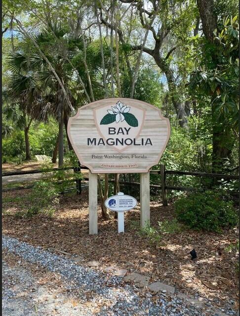 Beautiful large wooded homesite in the highly desirable Bay Magnolia subdivision.  No build out time and flood zone X.  Only minutes to the bay and beaches. Buyer to verify all dimensions.