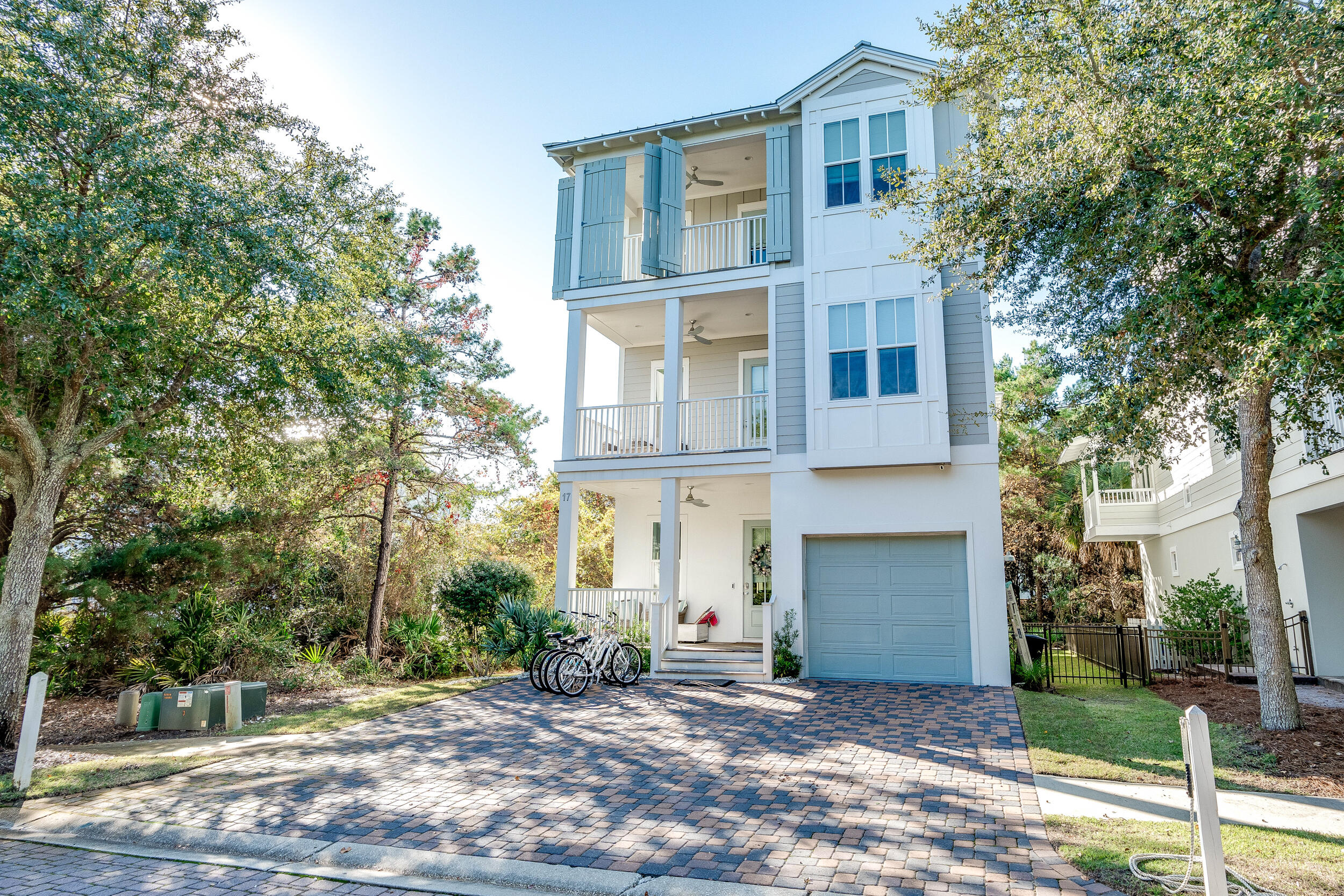 Discover this magnificent 4-bedroom, 3.5-bathroom residence nestled in Inlet Beach, merely moments away from some of the most tranquil beaches in the region. It's also conveniently close to the renowned Rosemary Beach, Alys Beach, Seacrest Beach, and the vibrant 30Avenue dining and shopping area, all accessible via a brief bike ride. Positioned on a serene street within a quaint, upscale neighborhood, this 3-story home, constructed in 2018, radiates coastal elegance and is adorned with designer elements throughout. The ground floor is an entertainer's dream, featuring a spacious living room, dining area, and a gourmet chef's kitchen. Additionally, this level houses a single garage, a powder room, and ample storage space. The second floor is home to three bedrooms and a large secondary living space, ideal for children or visiting relatives. The entire third floor is dedicated to the luxurious master suite, providing a private retreat to unwind. This suite opens onto two covered porches, offering a serene spot to relish the gentle gulf breezes and stunning Gulf of Mexico views.
Other highlights of this exquisite home include a fenced yard, access to a community pool shared with just nine other residences, charming shiplap walls, and more, making this property a true gem in Inlet Beach.
Currently on the rental program with "30A Cottages" https://www.30acottagesandconcierge.com/vacation-rentals/tupelo-honey