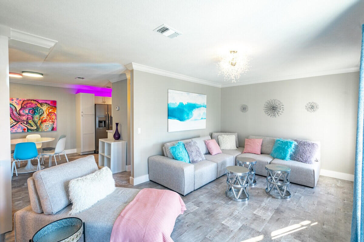 Comes fully furnished turn-key, with deeded beach access and boat slip available for rent from the HOA, at a low cost. Laguna Point Complex sits on the Harbor. The first floor is a one car garage with room to spare for storage. The second floor features the kitchen with granite counter tops, stainless steal appliances and a large living area. Third floor provides two bedrooms with their own bathrooms and ample closet space. Short distance, just a block away to the gated/deeded beach access. FEATURES : Harbor front, boat slips available for rent, small complex (16 units), new roof in 2020, great location, HOA protected, exclusive gated beach access. Parking is limited to one space in addition to the garage, with public parking located directly across the street for any additional vehicles.