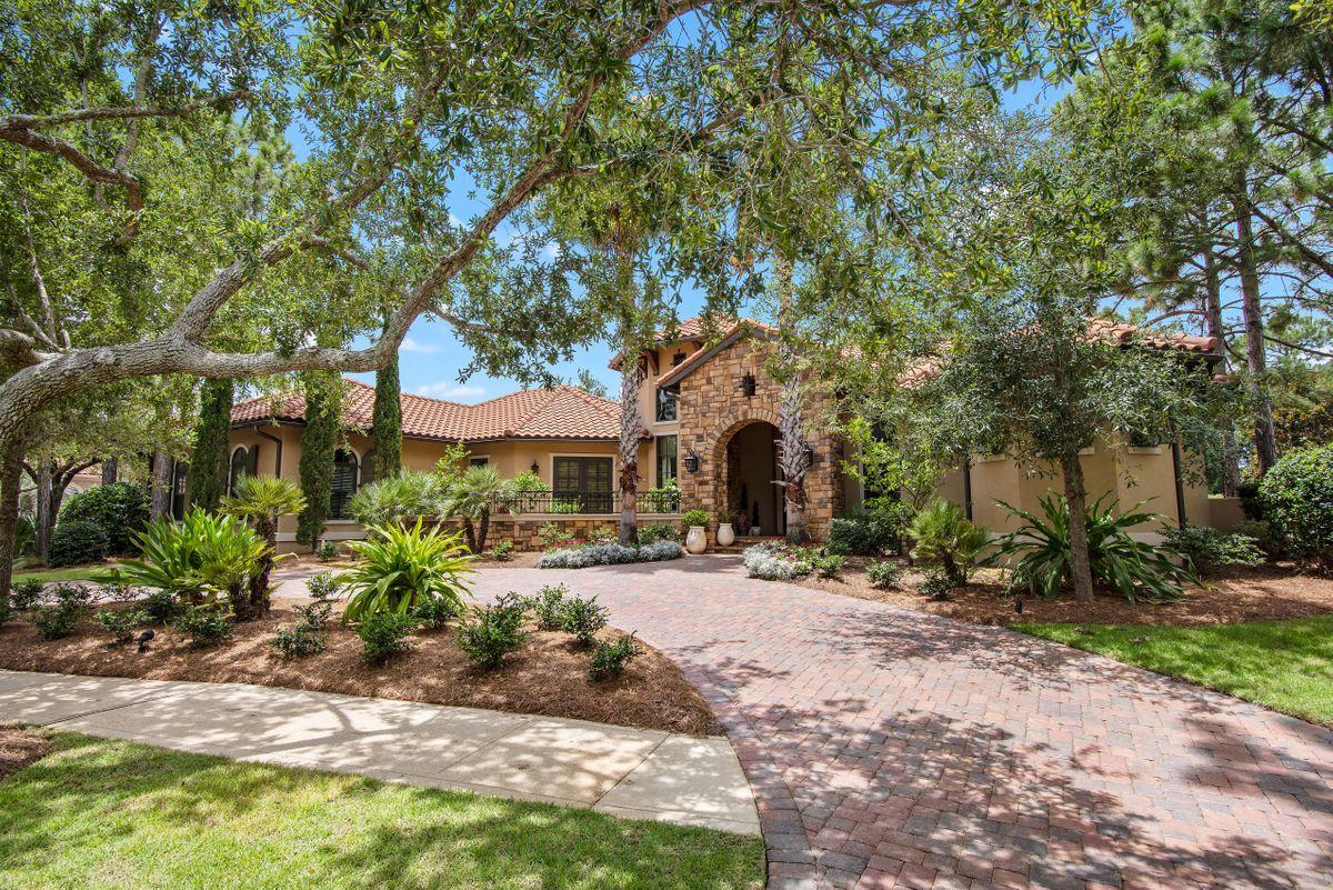 This single-story lakefront home is tucked in the Preserve neighborhood of Burnt Pine, and looks over the fourth hole at the Burnt Pine Golf Course. Built with high-quality ICF concrete for energy efficiency and strength, no detail was overlooked in the construction of this home, and its design features include antiqued travertine floors, custom cabinetry and built-ins, reclaimed wood accents and beams, and 8 ft curved windows that overlook an outdoor oasis. The open-concept living areas are ideal for entertaining, and a spacious chef's kitchen includes granite countertops, high-end appliances, beautiful lighting, and a large bar, as well as a separate breakfast area.
This elegant, three-bedroom home includes a luxurious master suite with a sitting area, fireplace, custom-fitted closets and a spa with a large soaking tub and walk-in shower. This bedroom also includes private access to the lanai while guest bedrooms have access to their own private flagstone patio. Enjoy lake views and several outdoor amenities, including a hot tub, saltwater pool, screened patio, living area with a fireplace and television, and a kitchen with a wet area, Viking refrigerator, cabinets, and a large Lynx gas grill. 

Additional features include two driveways, a two-car garage with room for golf cart storage, a surround sound system, tankless hot water systems, and a concrete-block safe room among several other thoughtful touches. The world renowned 2,400 acre Sandestin Golf and Beach Resort offers the ultimate in Florida living. With beautiful white sand beaches, four championship golf courses, a world class tennis complex, a 113 slip marina, and the pedestrian Village of Baytowne Wharf and Grand Boulevard with a full range of shopping, amenities, and dining.