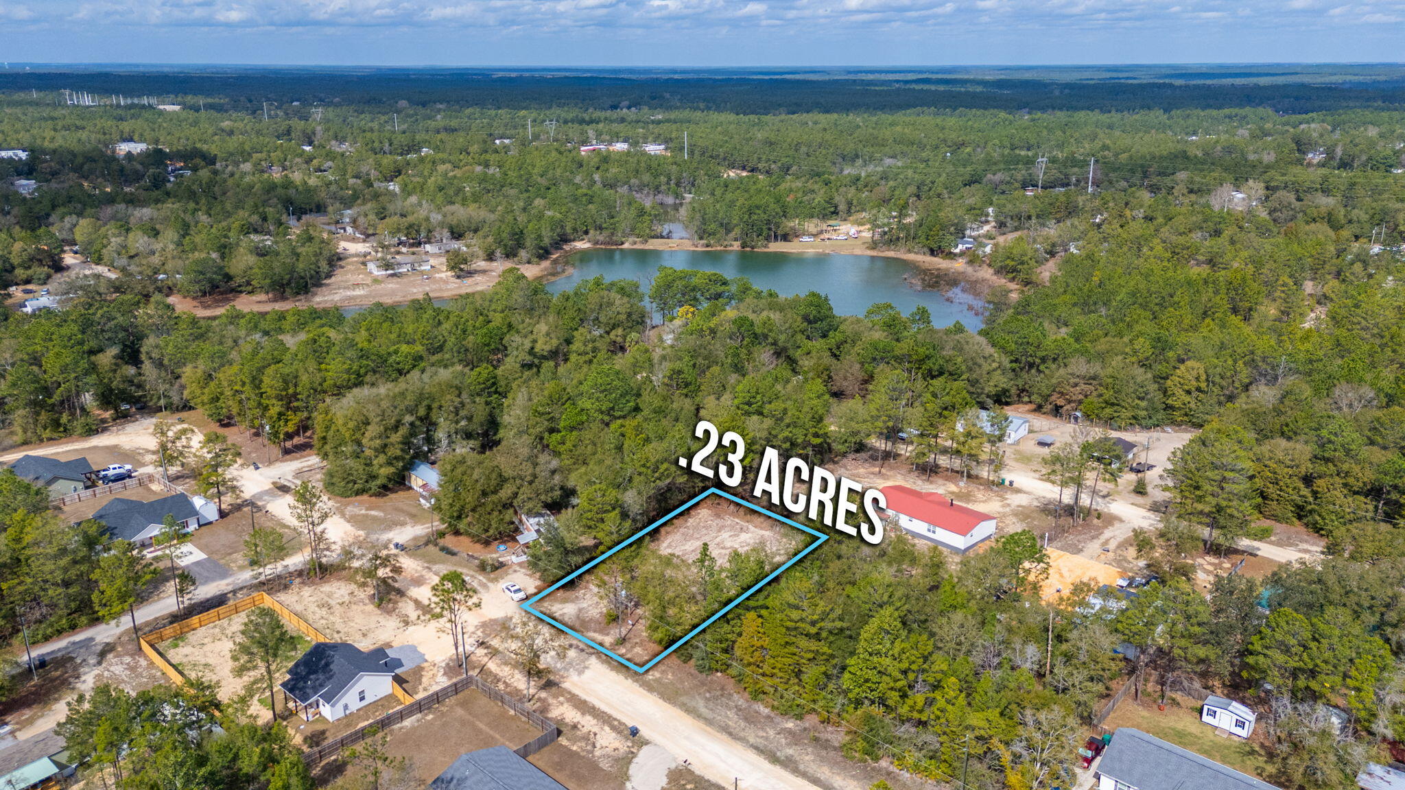 Nice flat and CLEARED lot with easy access to public water and power. It will need a septic tank, as sewer connection is not available in this area. County maintained road makes it easy in and out with only a short distance away from the pavement. Manufactured homes are allowed & there's no HOA! The dead end road means no pass-through traffic. The lot is 0.23 acres & 80 feet wide X 125 feet deep. Survey already done! This is a great lot with some of the beginning steps already taken care of. Contact us or your favorite realtor if you are interested.