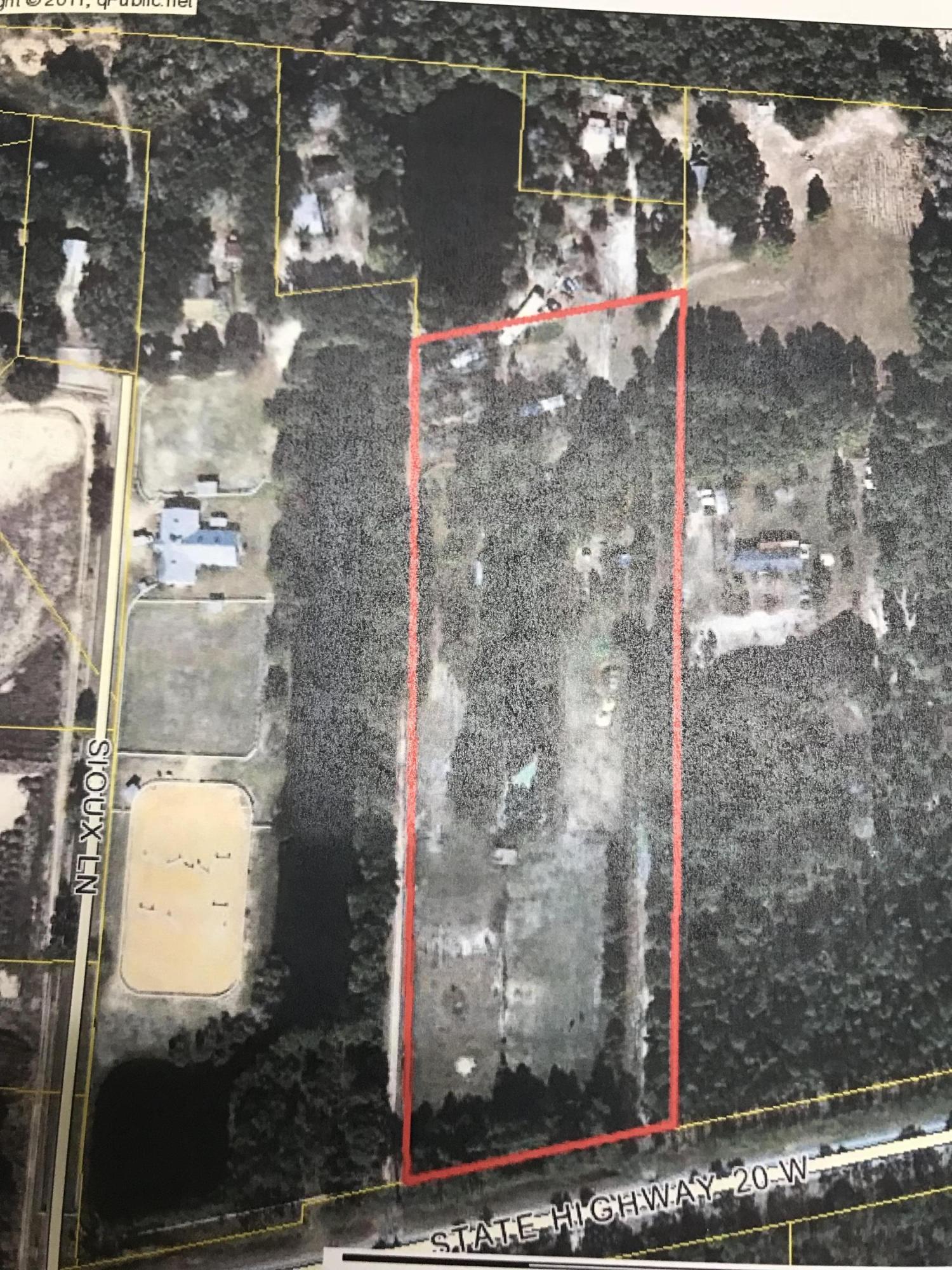 Great 11 acre parcel situated between Niceville and Freeport. The property was at one time a working Mobile Home park and is currently being used as pasture for horses. The property backs up to Eglin Reservation and has 2 ponds. The lease on the pasture in front is for 3 more years at $800 a month. The lease has a 30 day out clause for either party. This property has some large canopy oaks and the perfect home site. The manufactured home currently on the property is being sold as is and no value given. If you are looking for the perfect place to build, this one is ready for you.
