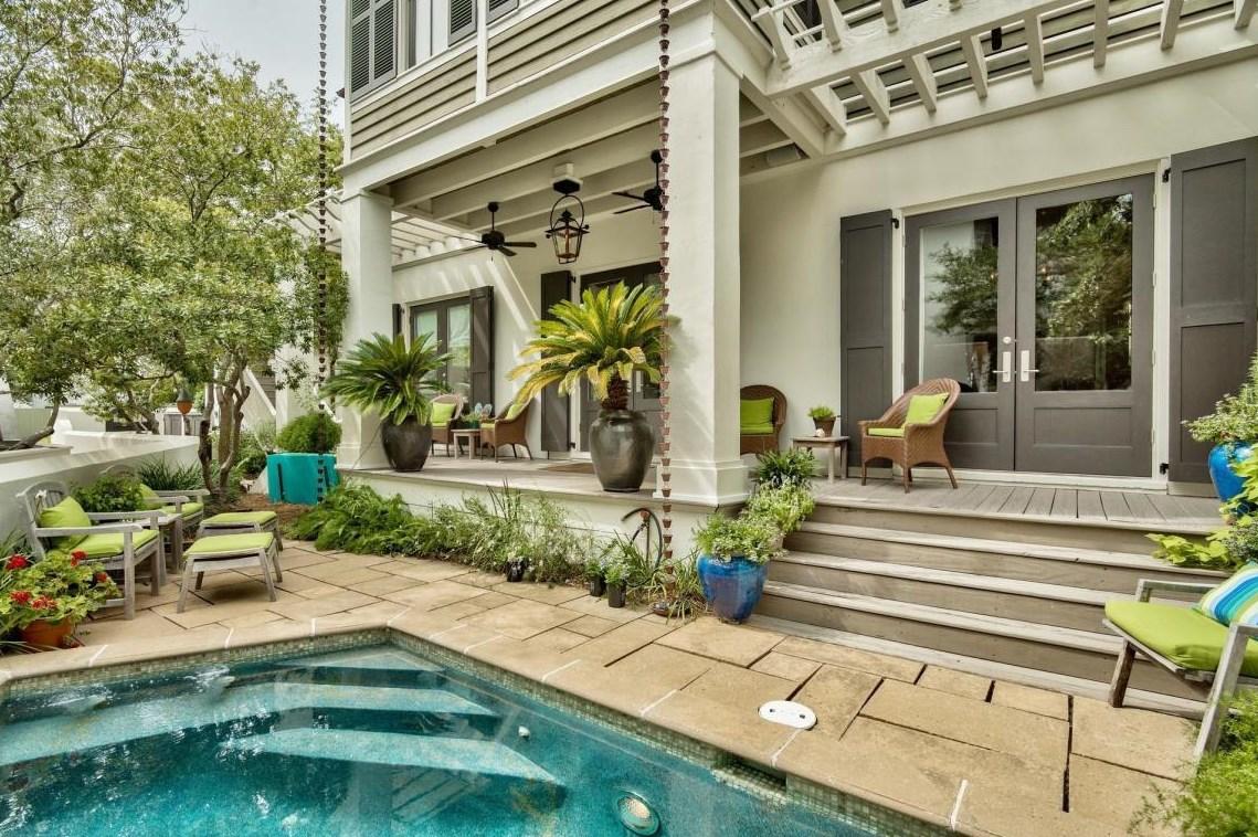 Located south of 30A in Rosemary Beach, this property proves that great things really can come in small packages. Interior design by prominent Atlanta designer Kay Douglass  and thoughtfully planned property layout ensures you're getting the most out of this beach escape. Inside the main house you'll find the downstairs framed under an impressive pecky cypress ceiling while the rustic ''beach-chic'' kitchen complements the cozy living room. The entirety of the downstairs opens up to overlook the beautifully landscaped courtyard sporting a jetted private pool. In addition to the kitchen and dining rooms, you will find a spacious master bedroom with en suite bathroom and private entrance from the courtyard. Upstairs you'll find the same pecky cypress ceiling spread throughout and a second master and guest bedroom with en suite baths. Just off the stairs lies a sitting area adjoining a bunk room with custom built in bunk beds!  Across the courtyard lies the carriage house above a two car garage a skillfully laid out floorplan allows for a King size bed, full kitchen, living room/sitting area and a breakfast nook. This property is a mere 500ft from the beach, 300ft to the community pool and 600ft to the Main Street offering every amenity Rosemary Beach has to offer, while never having to cross 30A. Sold AS IS and fully furnished. All measurements and dimensions are estimates and buyer should verify that which they deem important.