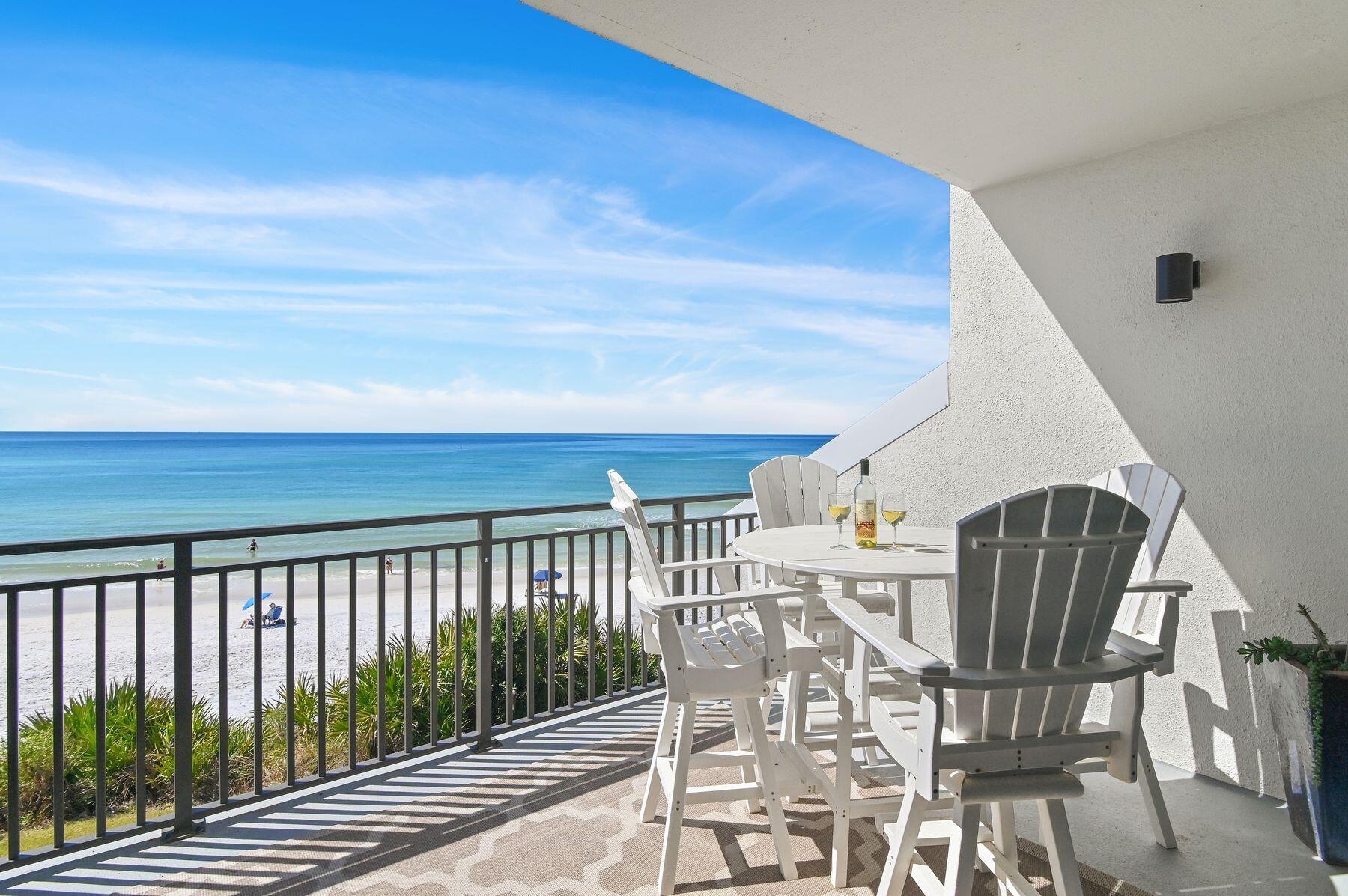 Perched on the dune's edge with breathtaking gulf views, this Emerald Hill residence is a rare opportunity in the heart of Seagrove Beach. This stunning three-bedroom, three-bathroom townhome offers a luxurious coastal retreat with direct private beach access and an unbeatable location along Scenic Highway 30A. Located in the exclusive, low-density Emerald Hill community, this residence is designed for comfort and convenience, whether as a full-time residence, vacation getaway or investment property. In addition to its prime Gulf-front setting, the townhome also includes an attached single-car garage—a rare and valuable feature in this area. Perfect for secure parking, additional storage, or beach gear and bikes, the garage enhances the ease of beachside living. The second floor showcases an open-concept living, dining, and kitchen area, where walls of windows frame spectacular gulf views. A spacious balcony invites you to unwind while enjoying the soothing sound of waves rolling onto the shore. The cook's kitchen is equipped with modern appliances and ample counter space, making it perfect for preparing meals with family and friends. A guest bedroom with a custom queen-over-queen bunk bed is also on this level. Upstairs, the gulf-front primary suite is a private oasis, complete with its own balcony overlooking the emerald waters. A third bedroom with a king bed and ensuite bath completes the top floor, offering additional comfort and privacy.  
The Emerald Hill complex boasts a large, sunlit community pool, ideal for relaxing after a day at the beach. With private gated beach access, you can step onto the sugar-white sands within moments. The 19-mile paved bike and walking path along 30A is just outside, allowing easy access to neighboring beach towns such as Seaside, Florida, WaterColor, and Alys Beach. The property is also within walking distance to charming cafes, popular restaurants, boutique shops and everyday conveniences. Some of the area's most beloved state parks are just minutes away, providing opportunities for nature trails, rare coastal dune lakes and outdoor adventures.  
Emerald Hill 6 is a rare findthere hasn't been a three-bedroom unit available in this complex for over nine years. Whether searching for a serene beachside retreat or a high-performing rental investment, this gulf-front townhome offers unparalleled views, a prime location and the ultimate 30A lifestyle.