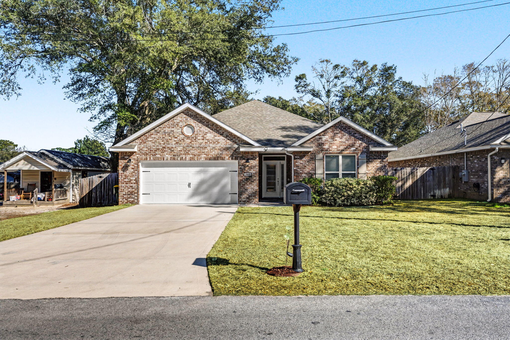 Welcome home to this like-new 2023 brick beauty, where modern style meets easy, low-maintenance living. This single-story, 3-bedroom, 2-bath home offers a thoughtfully designed open-concept layout that seamlessly connects the living, dining, and kitchen spaces—perfect for everyday living and effortless entertaining. Qualified buyers can ASSUME the current VA loan at 5% interest rate to save money!

The kitchen shines with granite countertops, stainless steel appliances, and plenty of workspace, all overlooking the main living area. Tile flooring anchors the main living spaces, while plush carpeted bedrooms create cozy retreats. A separate laundry room adds convenience, and the two-car garage provides ample storage.

Step outside to enjoy a fully fenced backyard with a covered back porch ideal for morning coffee, weekend grilling, or unwinding after a long day.

Best of allNO HOA and a central location just minutes from town, shopping, dining, and nearby military installations, making this home a smart choice for both homeowners and investors alike.

Clean, modern, and move-in readythis one checks all the boxes. Come see it before it's gone! Bonus Details: Currently covered with Home Pest Defense for termite coverage, Live oak fiber internet is available at the property, TruGreen has managed the lawn, irrigation system is in place, & the home is fully electric but gas can be installed from Okaloosa Gas.