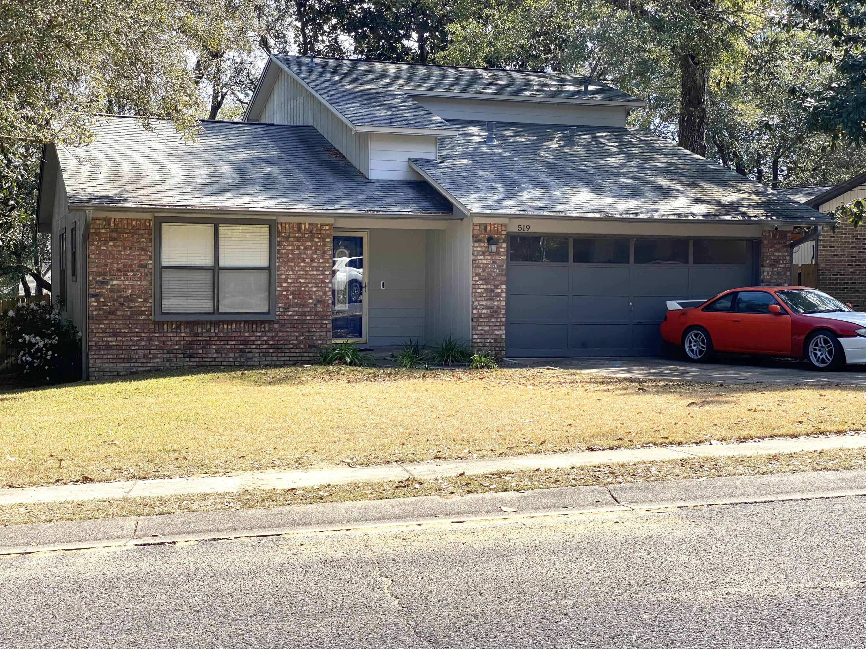 Great 3/2 home in the heart of Niceville! This home features large eat in kitchen with appliances (ice maker not warranted) & tiled floor for easy care. Living area has corner gas fireplace, hardwood flooring and access to back deck overlooking fenced in back yard. Grand main floor carpeted master suite with an abundance of natural light is able to accommodate larger furniture and offers 2 spacious master closets. Master bath offers separate vanity area and beautiful custom tile in tub/shower combination. Main floor Power Room offers custom tiled touches. Upstairs you'll find two carpeted bedrooms, each with a private balcony overlooking the back yard and a convenient guest bathroom. A two car garage with washer & dryer provided but not warranted and nice sized back yard finish off this  great home. Owner will consider pets with restrictions and non refundable pet fee. Any pet must be spayed/neutered, housebroken and current on all shots. Any persons 18 years old or older must apply separately. Tenants required to carry renter's liability insurance.