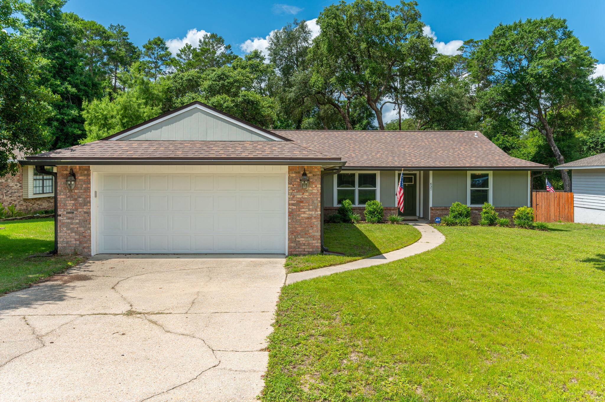Don't miss this charming and nicely updated home in sought-after Bluewater Bay, with no HOA!

Packed with modern upgrades, this home features wood and travertine flooring, new trim, solid core interior doors, new exterior doors and windows, and a new garage door. The renovated kitchen includes new countertops and appliances along with updated lighting and plumbing fixtures.  A new water heater adds peace of mind.

The master bathroom has been beautifully renovated, and all bedrooms include walk-in closets.  The home lives much larger than its square footage suggests!

Outside, enjoy the brand-new deck and a huge, fenced backyard with private gated access to the neighborhood green space and walking trail. 

Move-in ready and full of thoughtful updates, this home is a must see!