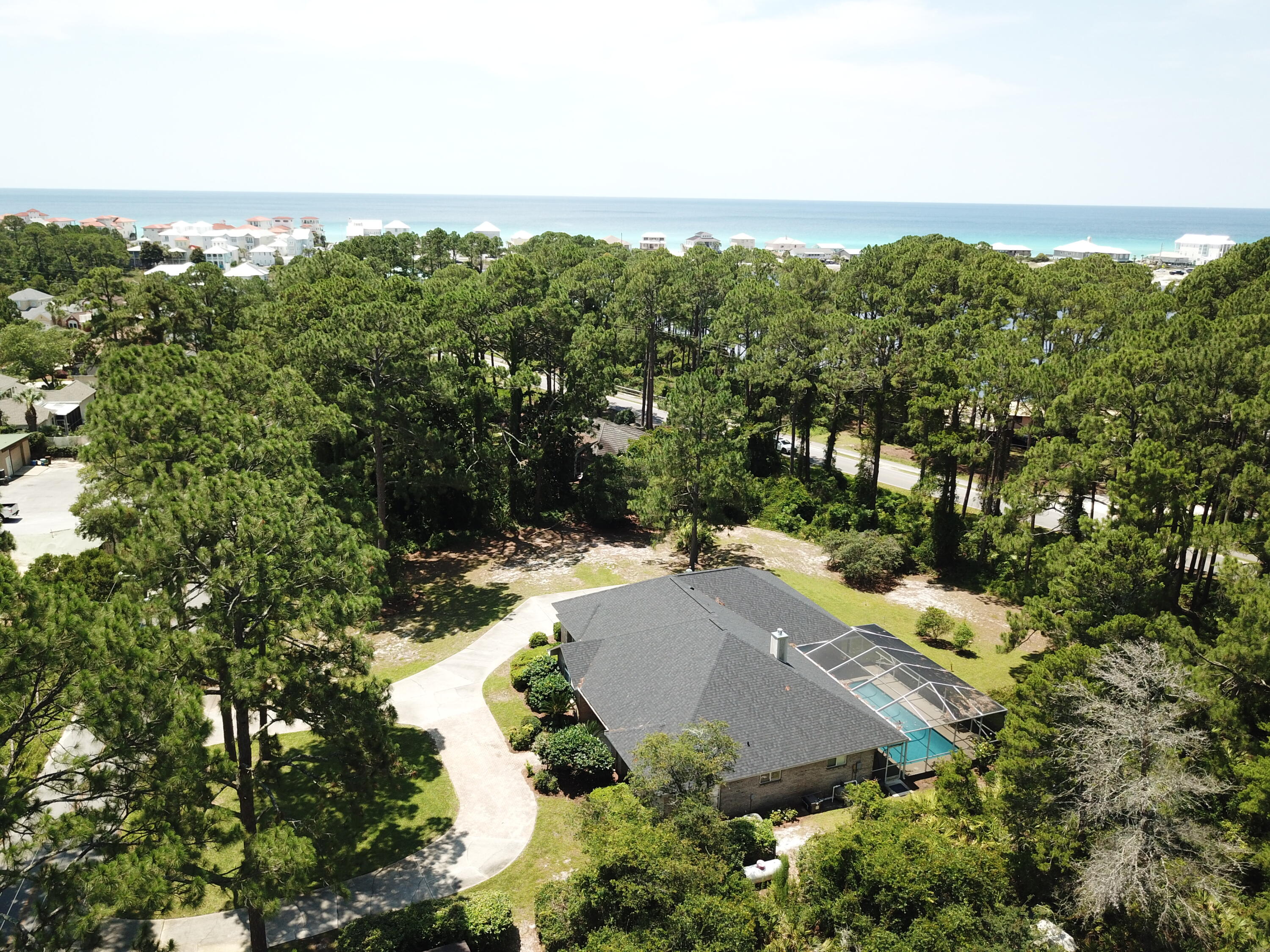 Welcome to your dream coastal retreat in Santa Rosa Beach, Florida! This exquisite real estate gem offers the perfect blend of luxurious living and breathtaking natural beauty. Nestled on a generous .87-acre lot, this 3-bed, 2-bath home spans an impressive 2,530 square feet, ensuring ample space for comfortable living. Situated just 600 steps from the pristine shores of the Gulf of Mexico, this property grants you convenient public access to the stunning beaches Santa Rosa Beach is renowned for. Imagine enjoying sun-kissed days on the sandy shores, indulging in water sports, or simply basking in the tranquility of the ocean waves.  Not only does this coastal oasis boast beach proximity, but it also across the street of the serene Oyster Lake. This natural wonder enhances the ambiance an provides a captivating backdrop for your everyday experiences. 

As you step inside this remarkable residence, you'll immediately notice the attention to detail and impeccable craftsmanship throughout. The heart of the home is undoubtedly the chef's kitchen, complete with a large island, custom cabinetry that stretches to the ceiling, and top-of-the-line appliances. Whether you're a seasoned culinary enthusiast or simply enjoy hosting memorable gatherings, this kitchen is a true delight.

The master bedroom serves as a tranquil haven, featuring a sitting area that overlooks the screened-in pool and outdoor living area. Start your day by waking up to breathtaking views and rejuvenate in the serene atmosphere. The screened-in pool invites you to take a refreshing dip or simply unwind in the privacy of your own backyard oasis.

If you've been searching for the perfect coastal escape, look no further. This remarkable property combines coveted location, spacious living, and luxurious features, new AC's with transferable warranties, new roof, new hot water heater, creating an unparalleled opportunity to embrace the Santa Rosa Beach lifestyle. Don't miss out on the chance to make this stunning property yours. Contact us today to schedule a private tour and experience the allure firsthand.  Excellent Rental with over 100K in rental potential.