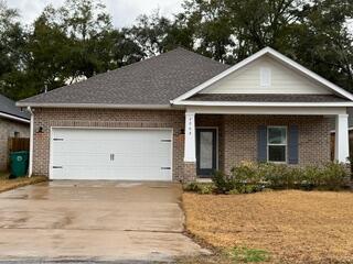 Welcome to this stunning 4/2 open concept home!  The home features luxury vinyl plank throughout.  Loads of pantry storage, wood cabinets, large island, quartz countertops, stylish backsplash, and stainless appliances make this kitchen a dream.  Well-appointed main bedroom suite with a massive walk in closet.    Relax and spend your evenings looking out to your fully fenced in back yard in the comfort of your cozy screened in porch.  A spacious laundry room and two car garage round out this beautiful like new home.  Less than ½ a mile away you can enjoy a scenic walk or picnic through Turkey Creek Nature Trail.  A short drive to schools, shopping, dining, the marina, and Eglin Air Force Base, make this the perfect location.  The white sandy beaches of Destin are only a 25 minute drive.
