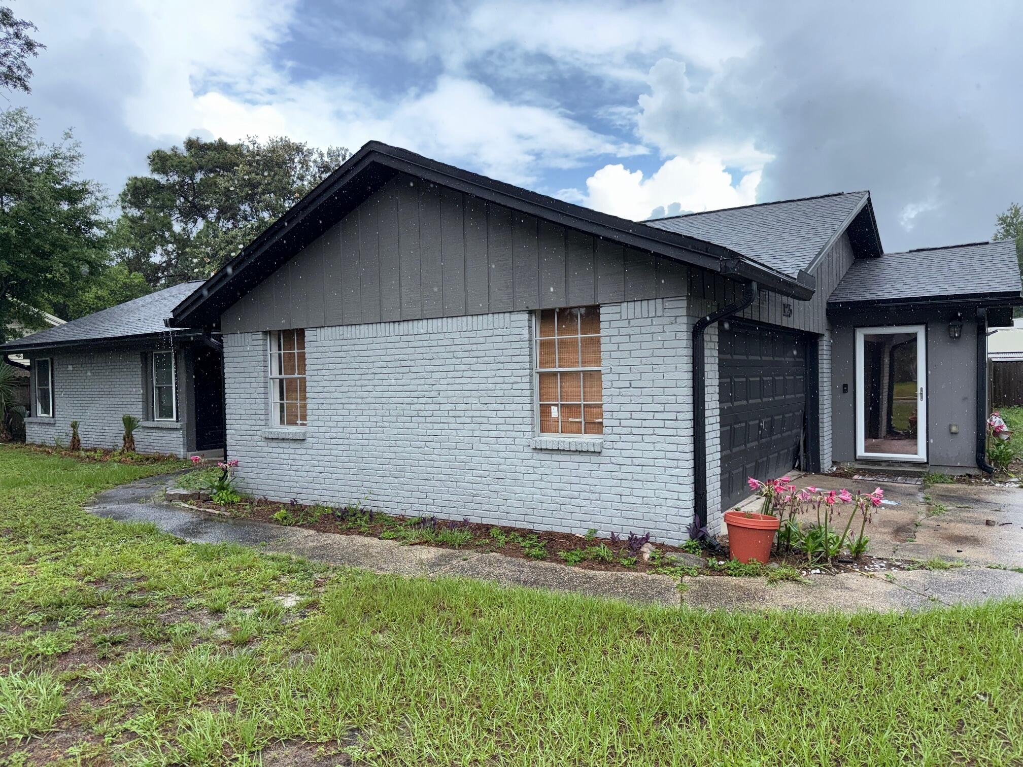 Bank approved price at $315,000. Home needs work and is being sold strictly AS IS. Privacy fencing. Located just far enough from Racetrack Rd to avoid the busy roads. Buyer to verify all pertinent including square footage and lot dimensions.