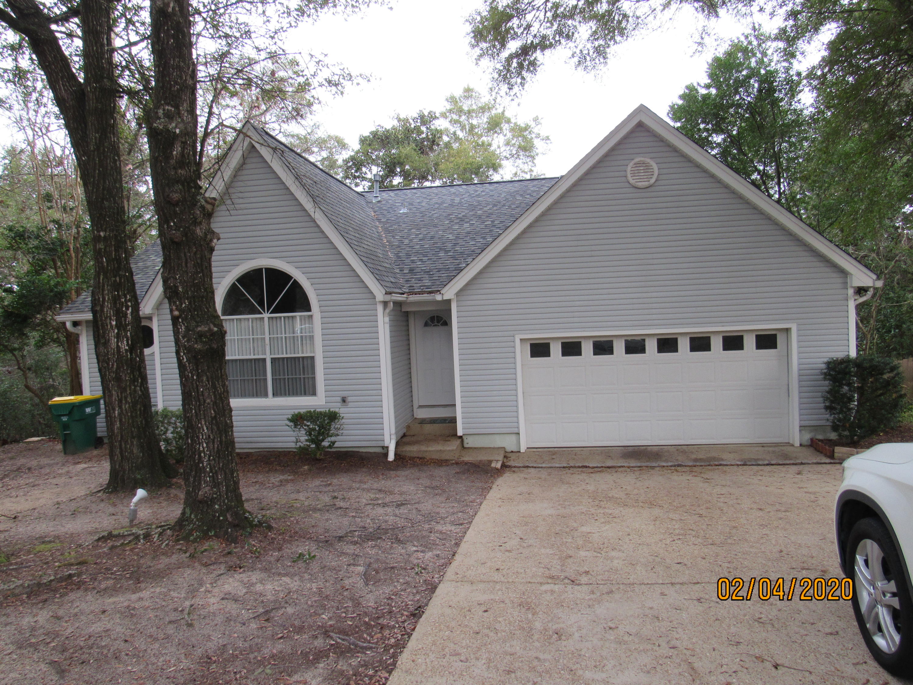 Beautifully renovated 3 bedroom 2 bath home with a large deck and 2 car garage close to schools, shopping, and entertainment.