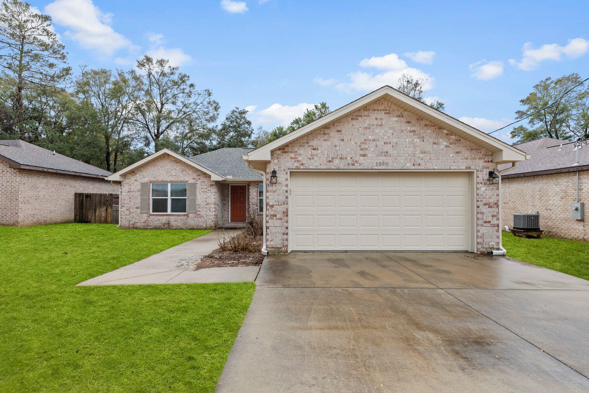 Welcome to this beautiful 3-bedroom, 2-bathroom home located in the HEART of Niceville. This house offers a modern and stylish living experience with its luxurious amenities. Step inside and be greeted by the stunning LVP flooring that adds a touch of elegance to the space. The kitchen boasts exquisite granite countertops, perfect for preparing meals and entertaining guests. The stainless steel appliances provide a sleek and contemporary feel, making cooking a breeze. The tray ceilings add a touch of sophistication to the living areas, creating an open and spacious atmosphere. After a long day, unwind in the indulgent soaking tub, offering a tranquil retreat within the comfort of your own home. Step outside and discover the expansive backyard, perfect for outdoor activities and gatherings with the added luxury of lawn care included with rent. Enjoy the warm Florida weather on the large backyard deck, ideal for hosting barbecues or simply relaxing with a book. This house is truly a haven for those seeking both comfort and style. Don't miss out on the opportunity to make this house your home. Contact us today to schedule a tour and experience the luxurious amenities this house has to offer!