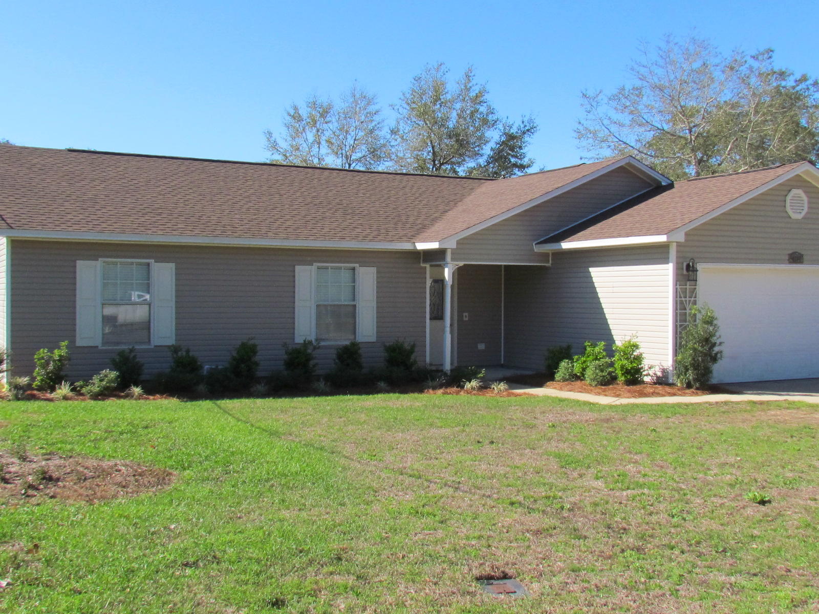 Nicely renovated 2,000 square foot home located in the heart of Niceville! Every room in the house has undergone a number of upgrades. The spacious kitchen comes complete with a breakfast bar, brand new stainless steel appliances, granite counter tops, cabinets, and a farmhouse sink. New hardwood flooring, title, interior paint, light fixtures, ceiling fans, and mirrors have been installed throughout the home as well.
