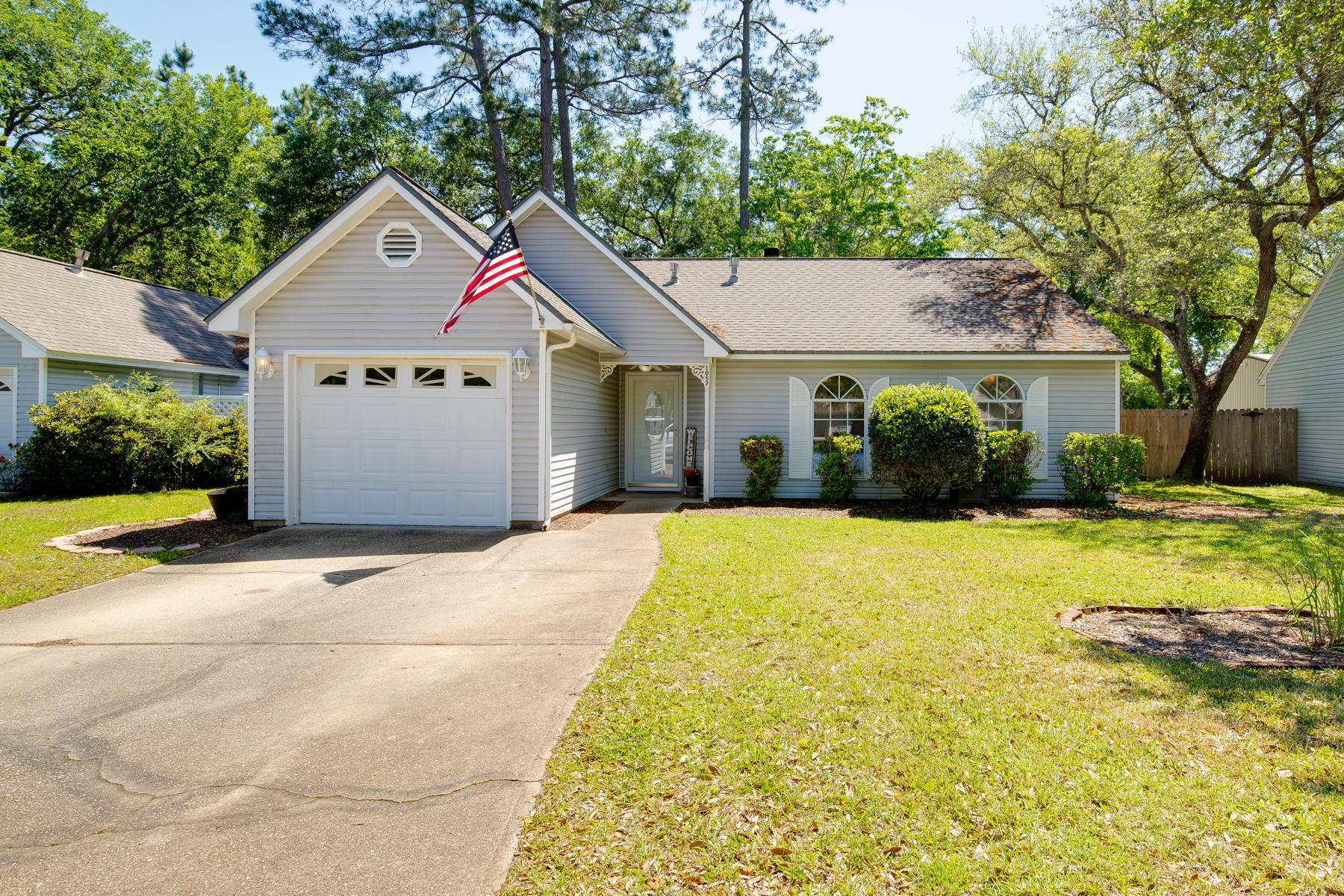 Do you enjoy NATURAL LIGHT illuminating your living areas? Does a cute PERGOLA and FIREPIT and a COMMUNITY POOL encourage you to enjoy outdoor activities more? Does a FIREPLACE make winters that much more cozy for you? Have you always wanted a GAS STOVE to bring out the chef in you? Would it help to be CENTRAL to Hurlburt (3 min 28 seconds - we timed it!), Eglin AFB (14 mins) and Duke Field (27 mins)? If so, this home is worth seeing! Other home features: stainless steel appliances as well as washer/dryer, tile and laminate floors throughout, 1 car garage, visitor parking located at the final roundabout, and a quiet cul de sac location.

Buyer to verify ALL dimensions, square footage and items of importance.