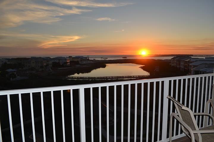 13% Estimated ROI!! NEWLY RENOVATED, AFFORDABLE CONDO W/AMAZING VIEWS & $46,400 PROJECTED RENTAL INCOME! Exclusively located away from noise, traffic & the masses at the end of Holiday Isle in just a 7 story complex, feel your stress melt away as you take in gorgeous Gulf, East Pass & Lake views. Enjoy fabulous sunsets from your living room, kitchen, bedroom & balcony. Moreover, this condo's unique location provides gorgeous, lighted evening views as opposed to pitch black evening views of the Gulf. Newly renovated w/beautiful white Kitchen w/granite, SS appliances, glass backsplash & pull out pantry, fresh paint, curtains & furnishings, scraped ceilings, crown molding, updated baths & new doors & hardware, this condo makes the perfect beach getaway! Offering deeded beach access, 2 pools (1 heated), tubs, several tennis courts, shuffle boards, a basketball area, a small gym & poolside pavilion with 8 BBQ grills and tables plus restaurants, shopping & golf close by, you have everything you need for a wonderful primary home, beach home or vacation rental property.  Recently replaced windows and doors throughout the complex provide peace of mind.  Act now and secure your own piece of paradise.