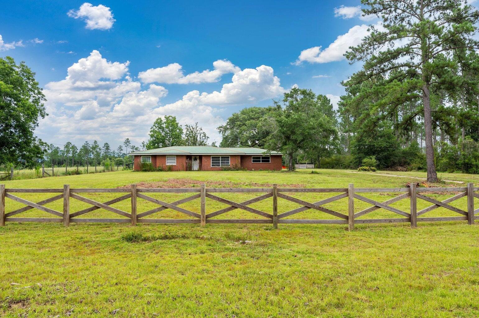Discover the ideal location with a fixer-upper/starter home that happens to also be Cattle Ready.  With pasture area, fencing some hardwoods, planted pines, and extensive paved road frontage, this is an exceptional opportunity to own a slice of paradise in this idyllic location. Embrace the tranquility of country living in the heart of Laurel Hill, while still being just minutes away from all essential amenities. Benefit from paved road frontage and convenient access to Hwy 602 and Hwy 85....

offering endless options inc Discover this ideal location with 10+/- acres and a starter home that will dazzle after a little hard work and your personal touch. This place is cattle-ready, with abundant hardwoods, planted pines, and extensive paved road frontage; this is an exceptional opportunity. Embrace the tranquility of country living in the heart of Laurel Hill, while still being just minutes away from all essential amenities. Benefit from paved road frontage and convenient access to Hwy 602 and Hwy 85....

offering options such as delicious dining, beautiful beaches, and diverse shopping centers.