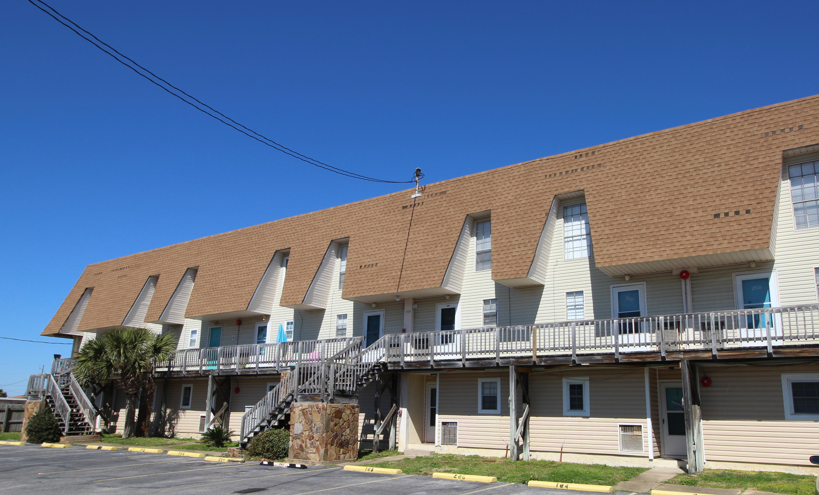 **AWESOME LOCATION - WITHIN WALKING DISTANCE TO THE MOST BEAUTIFUL BEACHES IN THE WORLD!** Very nicely maintained first floor unit with open floor plan, spacious bedrooms and covered patio. Freshly painted throughout. Call today for an appointment to view!