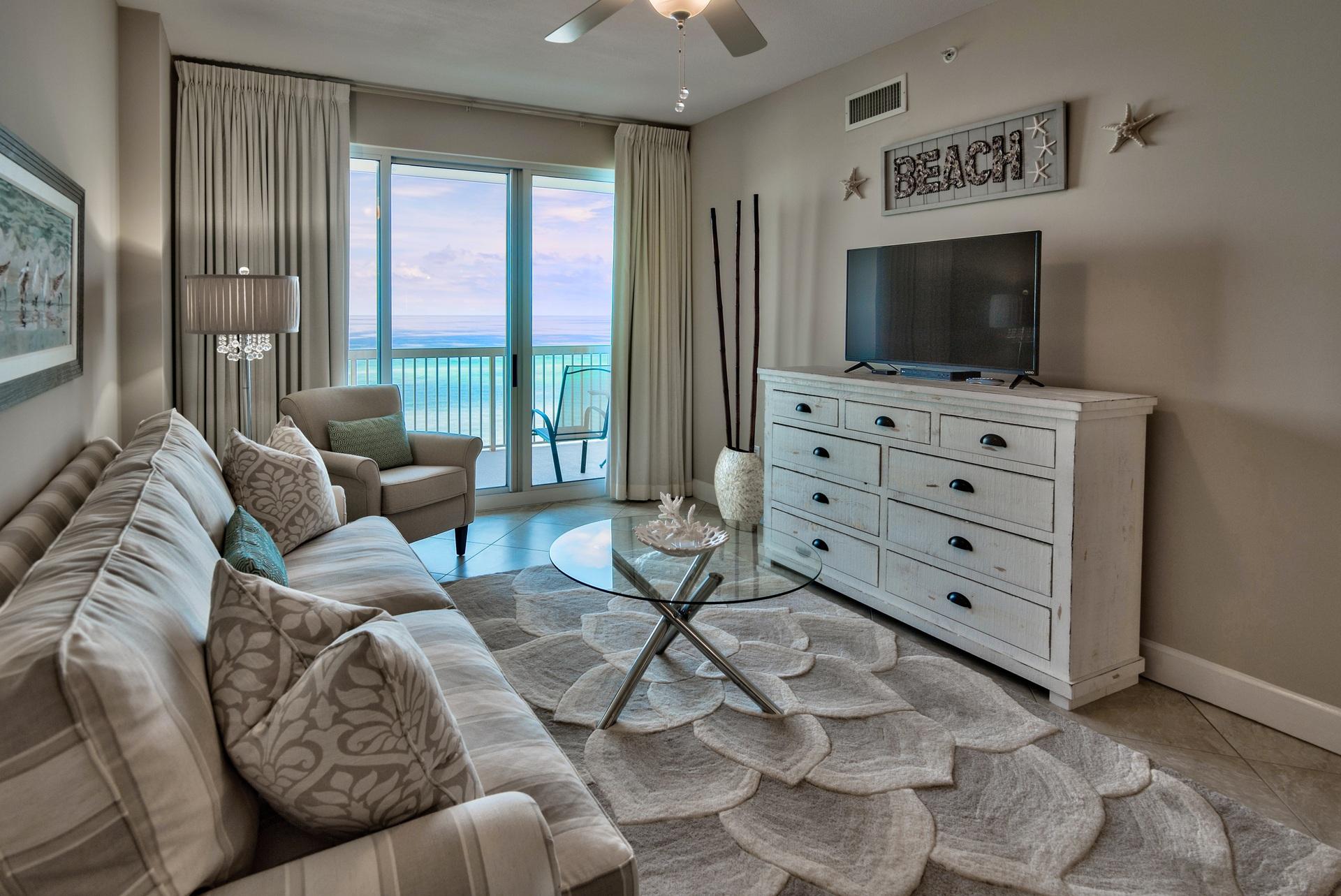 Phenomenal fully updated 2BR Gulf front condo with a bunk room & incredible views! This is a prime location in the complex on the desirable 8th floor - low enough to hear the waves from the balcony, yet high enough for privacy. This unit has been beautifully updated & well-maintained. Stunning 20'' porcelain tile flooring extends throughout the dining & living area and there is new carpet in the bedrooms. You will feel a sense of ease the moment you step into the unit with beautiful new furniture, fresh paint & inviting coastal decor. The unit has been professionally decorating and every detail is complete from the luxurious dining chandelier, updated fixtures, new appliances, custom drapes, mosaic tile backsplash, new cabinet pulls, vanity lights, mirror moldings & even new mattresses! Interior feels very spacious with the open floor plan and raised ceilings. The large balcony can be accessed from the living area or master bedroom and is the perfect place to relax, dine or entertain. The dining area is open to the living area and there is a granite breakfast bar to enjoy casual dining. The master suite is Gulf front and a private oasis separate from the guest bedroom. There is direct balcony access, a walk-in closet and en-suite bathroom with double vanity, garden tub to unwind in and separate walk-in shower. There is a guest bedroom towards the front of the unit which is a generous size and there is a guest bathroom. Linens, towels and decor is all updated and conveys. This 2-bedroom floor plan is unique because there is an additional bunk room so the unit sleeps like a 3 bedroom but is an incredible value! There is also an owner's closet and laundry room with a full size washer & dryer and added cabinetry for storage. In addition to all the new furniture and decorative details, even the big ticket items like the HVAC and all appliances were updated in 2015. The condo exterior, balcony and pool deck were just repainted (with no special assessment). This is an extremely beautiful, turn-key property that will not last long! 

Sunrise Beach has luxurious amenities including: 2 elevated Gulf front pools, one heated seasonally, 2 spas, large sun deck, spray park, owners lounge with full kitchen, Gulf front exercise room, theatre, plenty of underground parking, Gulf front gas grills, 330 ft. of beautiful white sandy beachfront. Aquatic Adventures is the onsite seasonal beach service that rents beach chairs & umbrellas and a variety of watersports including jet skis, catamarans, paddle boards, banana boat rides and parasailing! Sunrise Beach is a deluxe 25-story Gulf front complex with 275 units. It is located just east of Pier Park (apx. 1 mile) and only a short drive to Frank Brown Recreation Center and Gulf World marine park. Be sure to look at the attached Documents for additional information like the Upgrade List, Cost to Own and HOA Information.